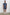 Aries Shorts with a Drawstring Waist, Two Front Pockets and a Buttoned Back Patch Pocket in Navy Cedar Vertical Colorway, with Thin Vertical Cedar Dashes on Navy - Front Full Body View Featured on Model