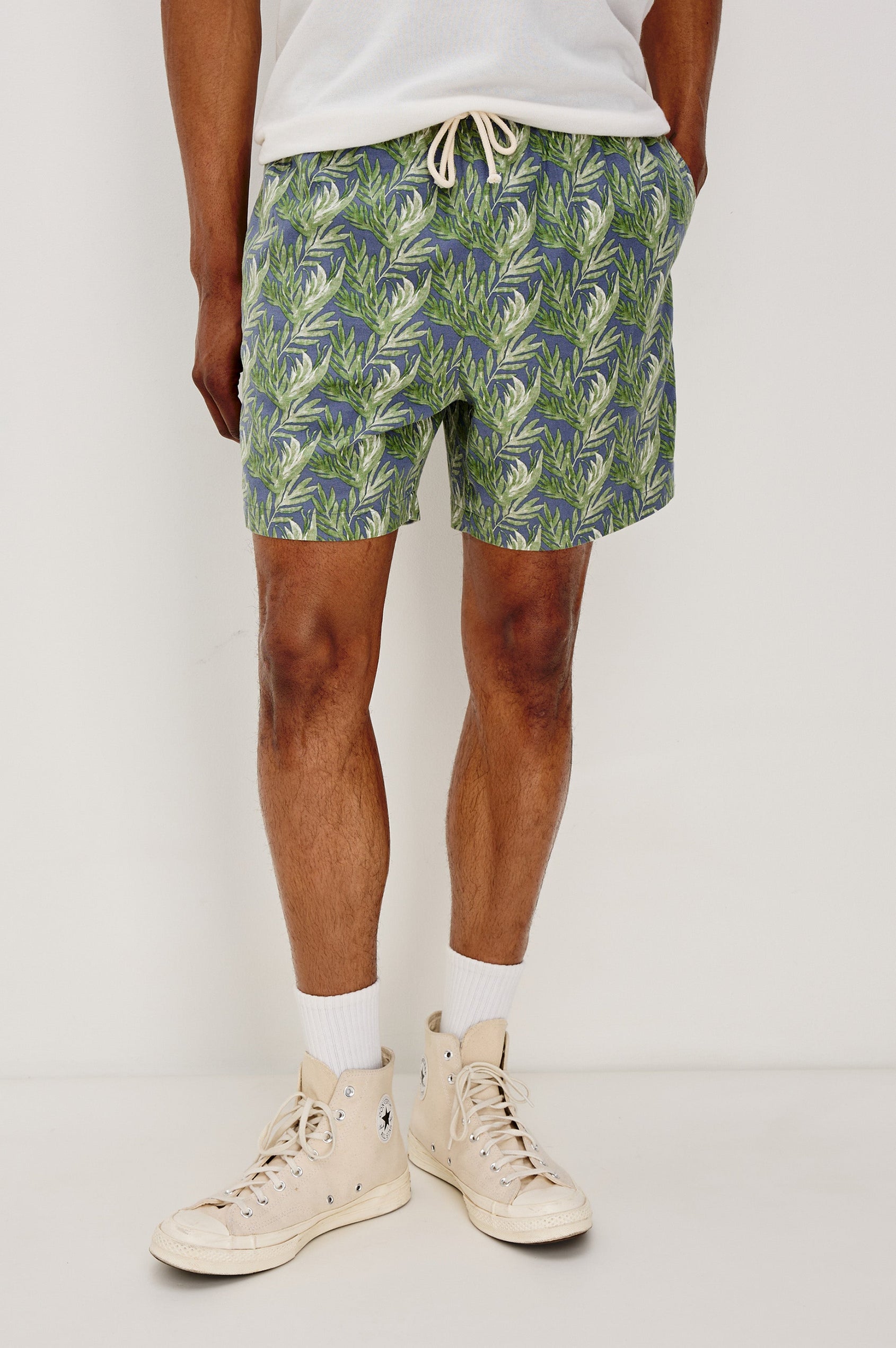 Aries mid length linen short with Side Pockets and a drawstring at waistband in Slate Seaweed Print Patter - front view on model.