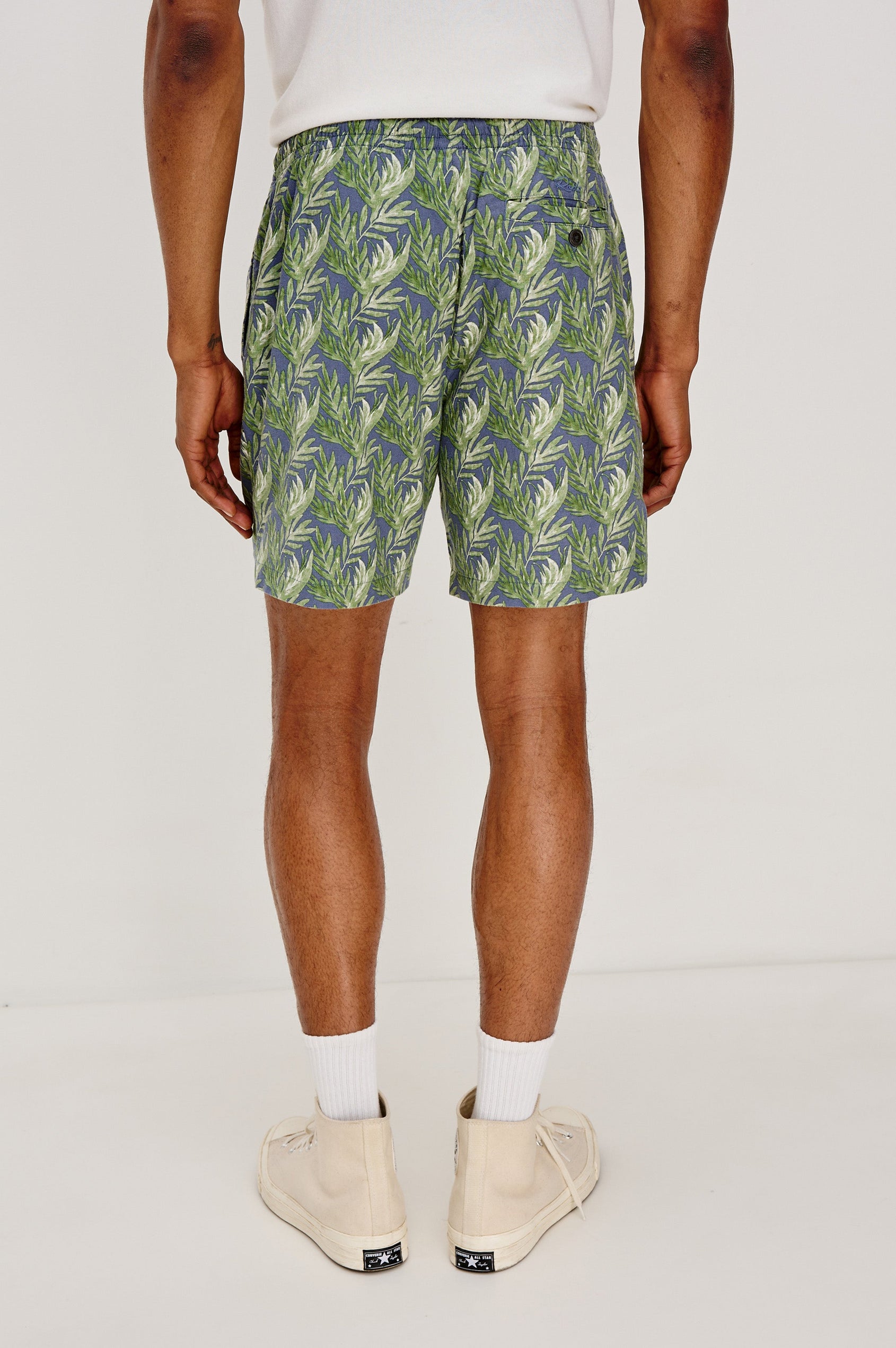 Aries mid length linen short with Side Pockets and a drawstring at waistband in Slate Seaweed Print Patter - back view on model.