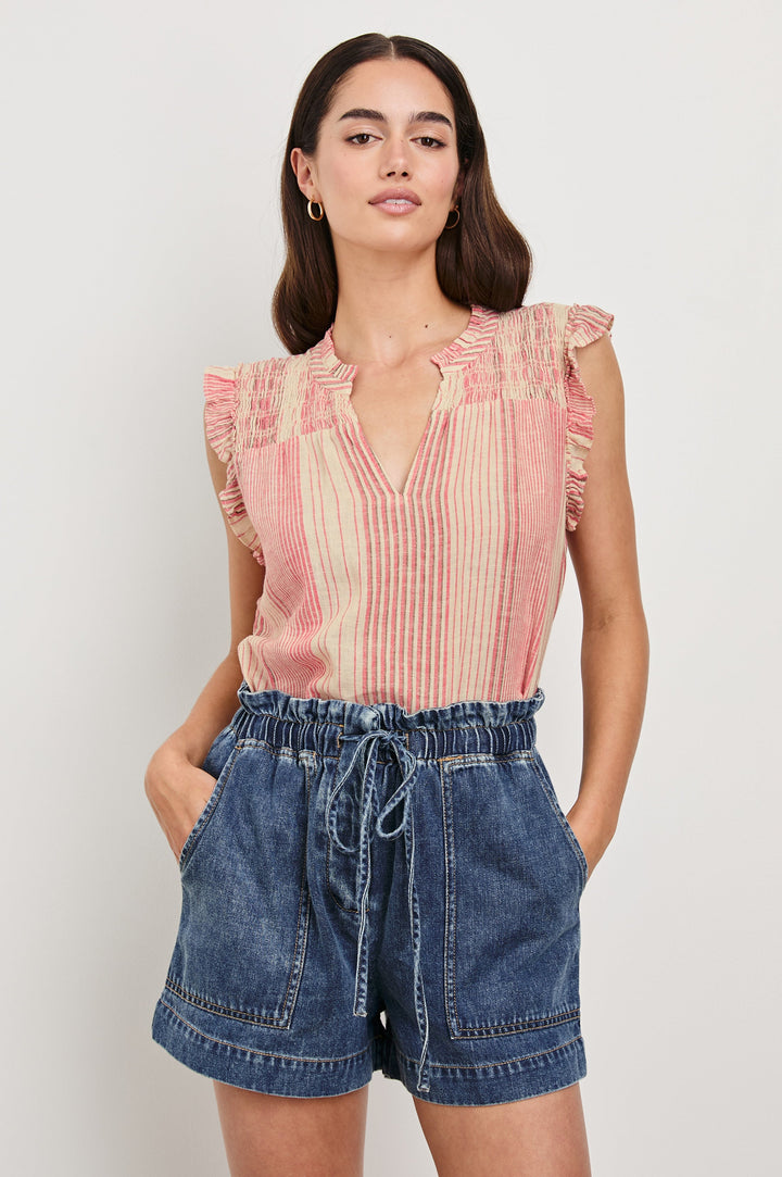 Arlene Top with Short Flutter Cap Sleeves, A V-Neckline and Shirring Along the Top Front in Salerno Stripe Colorway, Vertical Stripes in Sand and Salmon - Front Tucked View Featured on Model