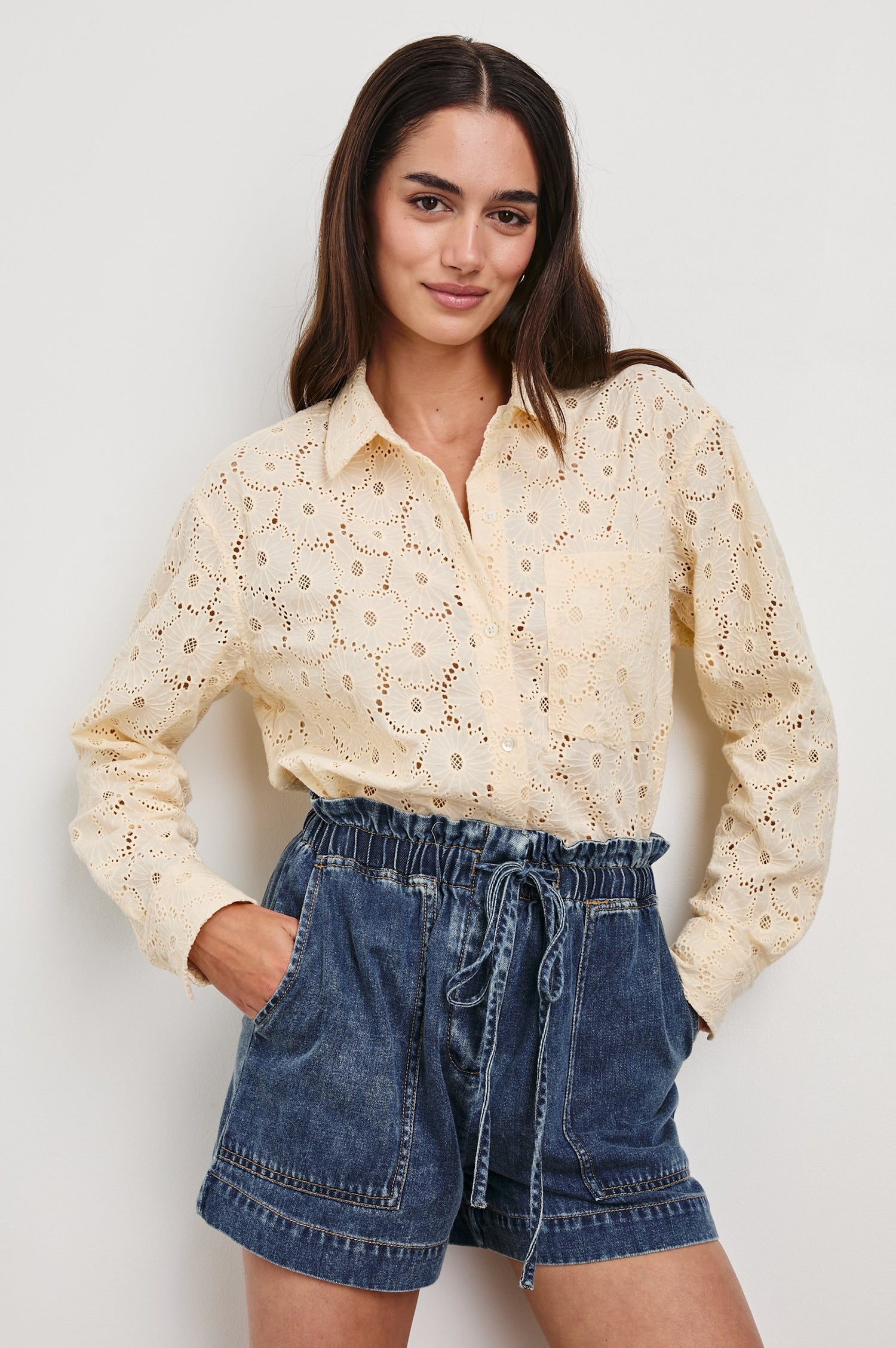 Arlo Long Sleeve Button Up with Chest Patch Pocket and Floral Eyelet Details in Cream Floral Colorway - Front Tucked View Featured on Model