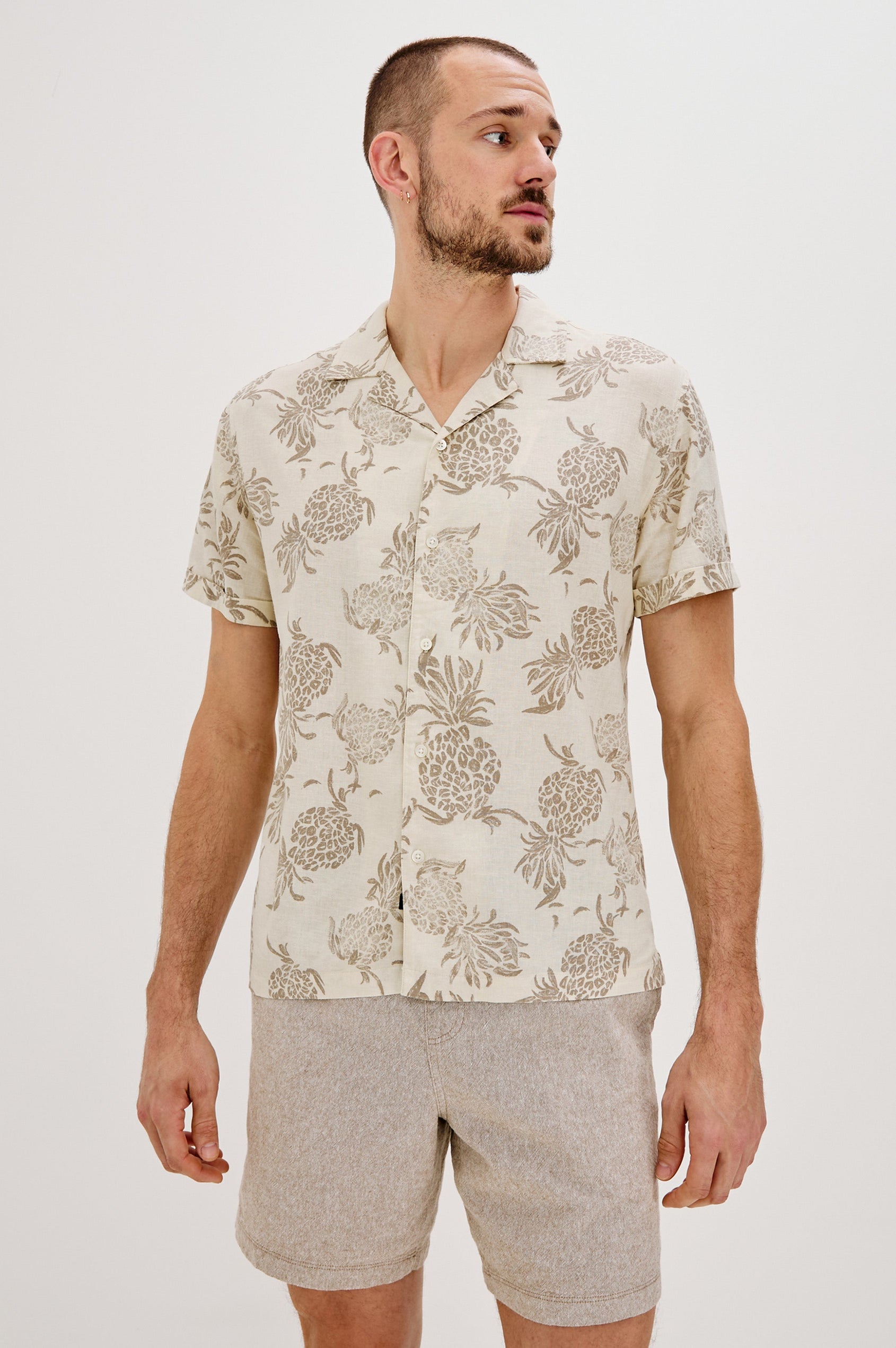 Atlas Printed Button Front Shirt with Short Sleeves, Flat Collar and Lapel in Pineapple Block Ecru Colorway. Front View Shown on Model.