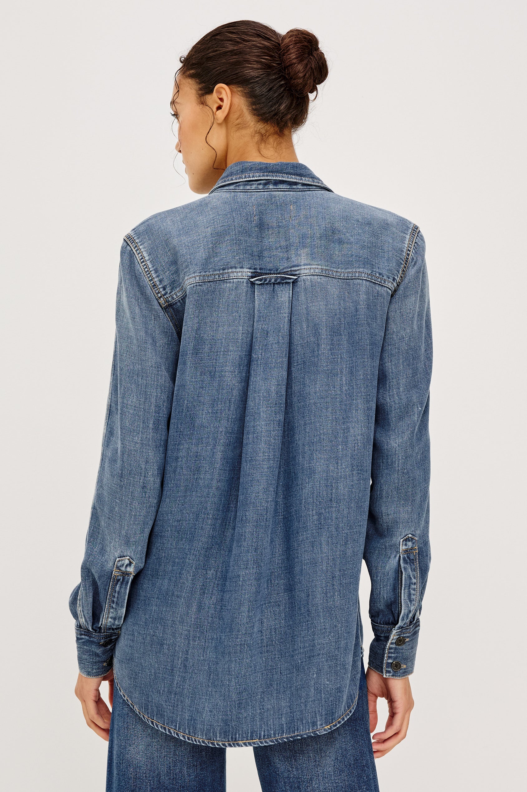 Atticus Shirt in Cotton Lyocell Denim With Collar, Long Sleeves, and Chest Patch Pocket in Antique Blue Colorway - Upper Body Back View Featured on Model