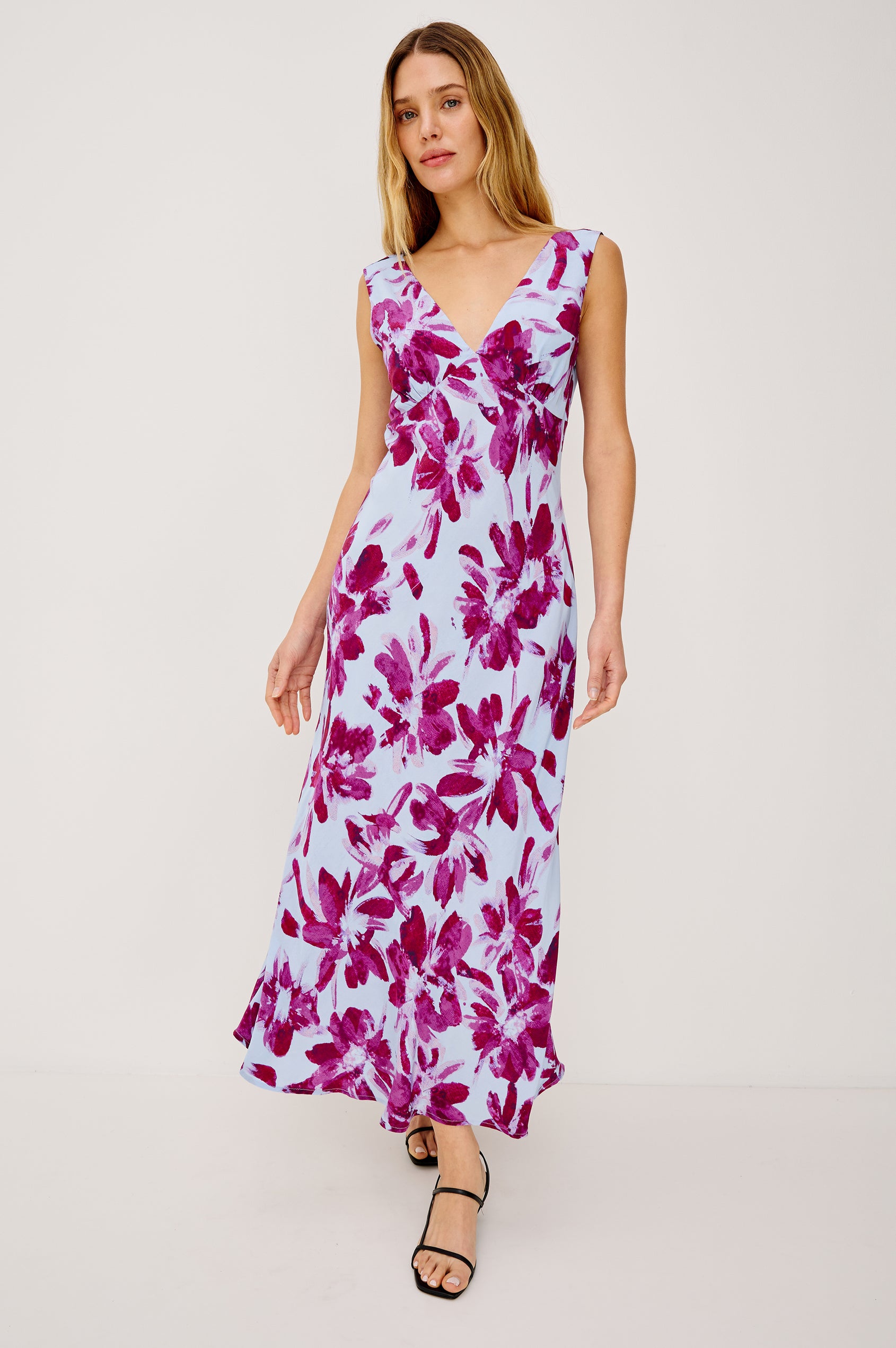 Audrina Sleeveless Midi Dress with Wide Shoulder Straps, a Deep V Neck and V-Back, and an Empire Waist in Blue Lily Colorway - full body front view on model