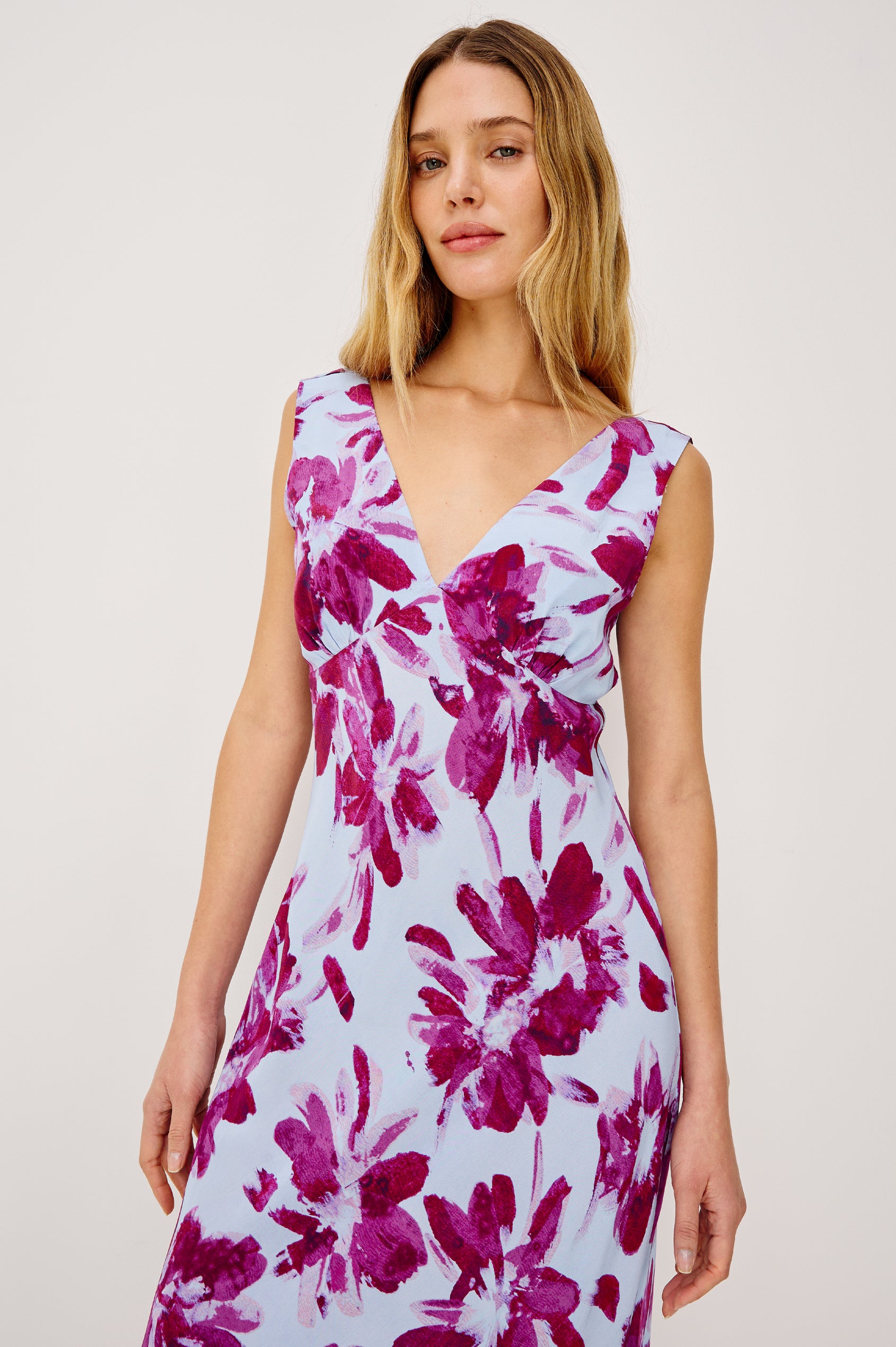 Audrina Sleeveless Midi Dress with Wide Shoulder Straps, a Deep V Neck and V-Back, and an Empire Waist in Blue Lily Colorway - front view on model