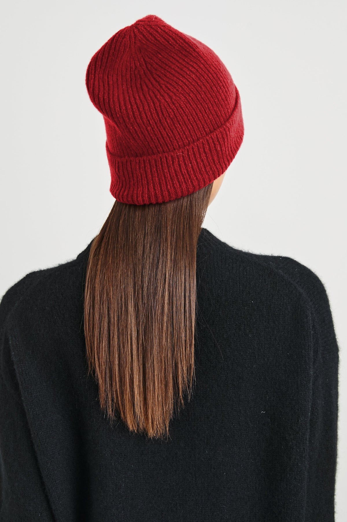Autumn Cashmere Silk Cuffed Beanie in Merlot Colorway - Back View Featured on Model