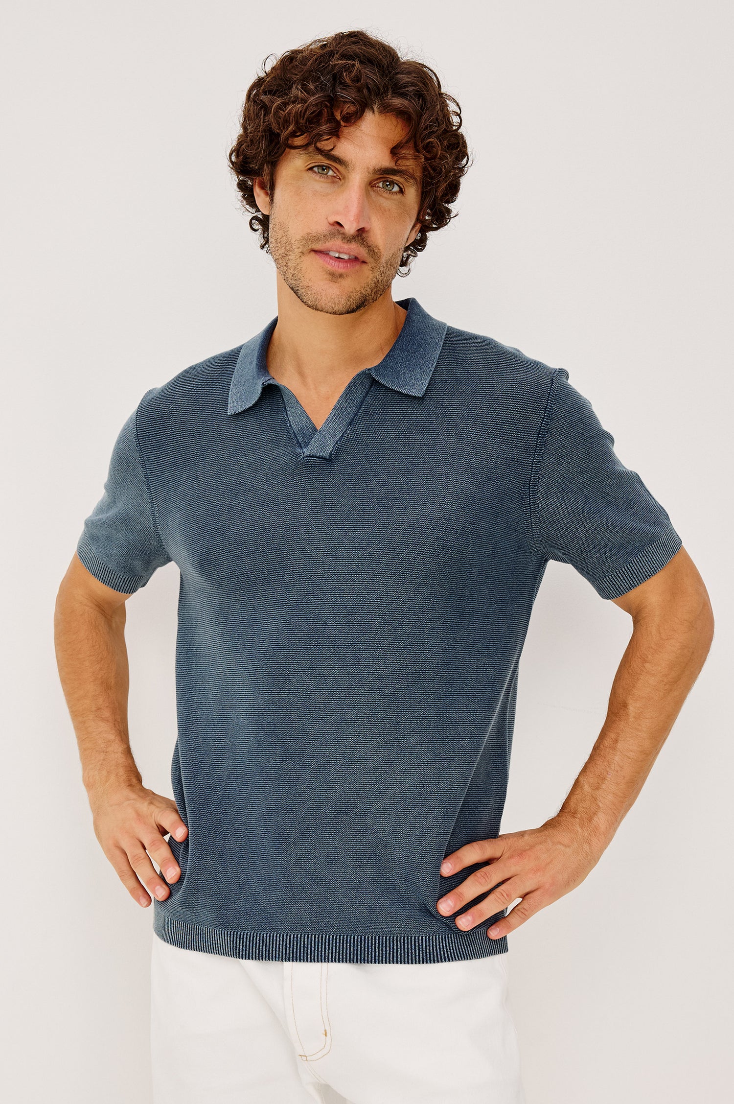 Baker Polo Shirt in Rib Cotton Knit With Colar, Short Sleeves, and Relaxed Fit in Sunwashed Navy Colorway - Upper Body Front View Featured on Model