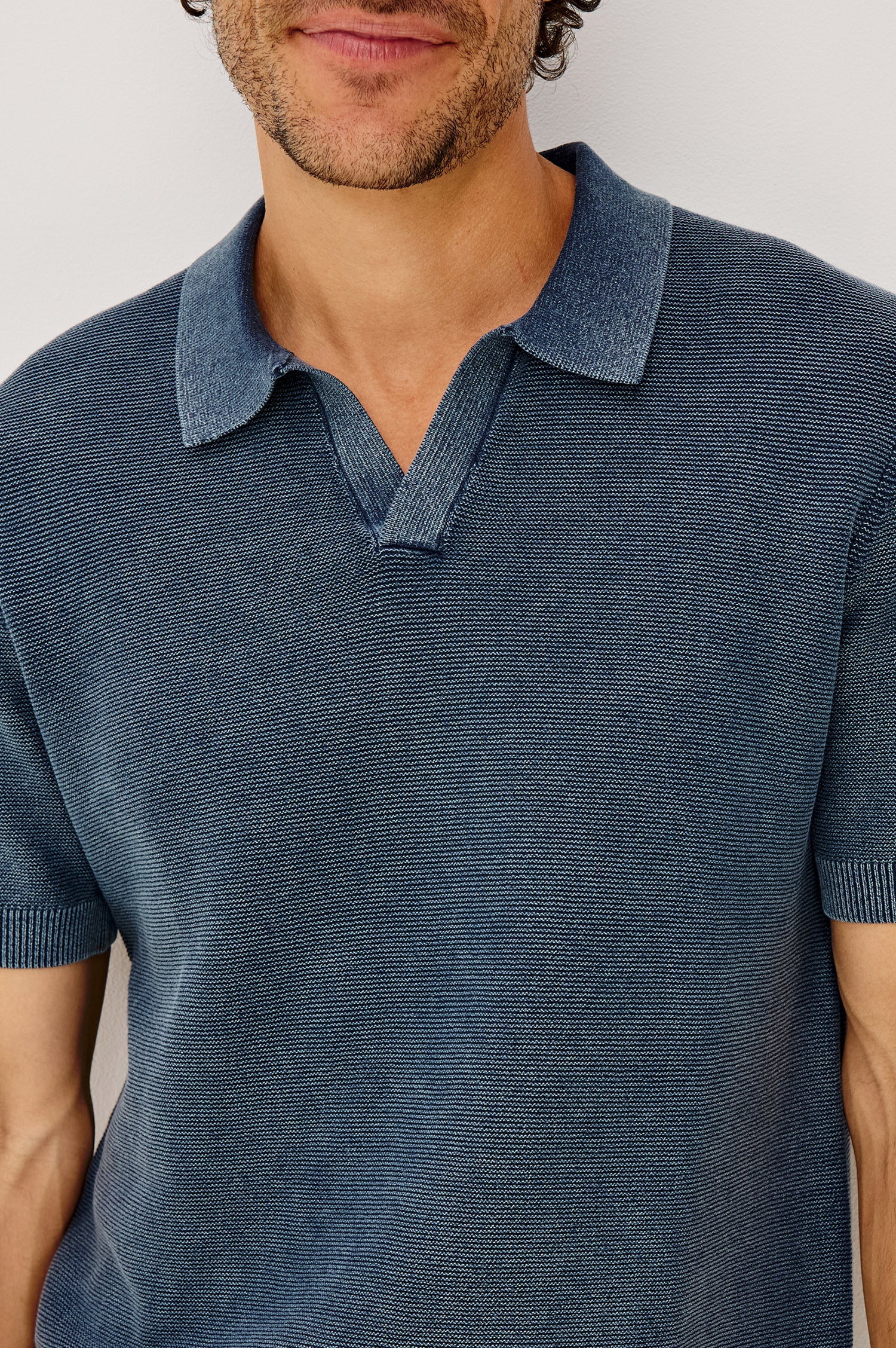 Baker Polo Shirt in Rib Cotton Knit With Colar, Short Sleeves, and Relaxed Fit in Sunwashed Navy Colorway - Upper Body Front View Featured on Model