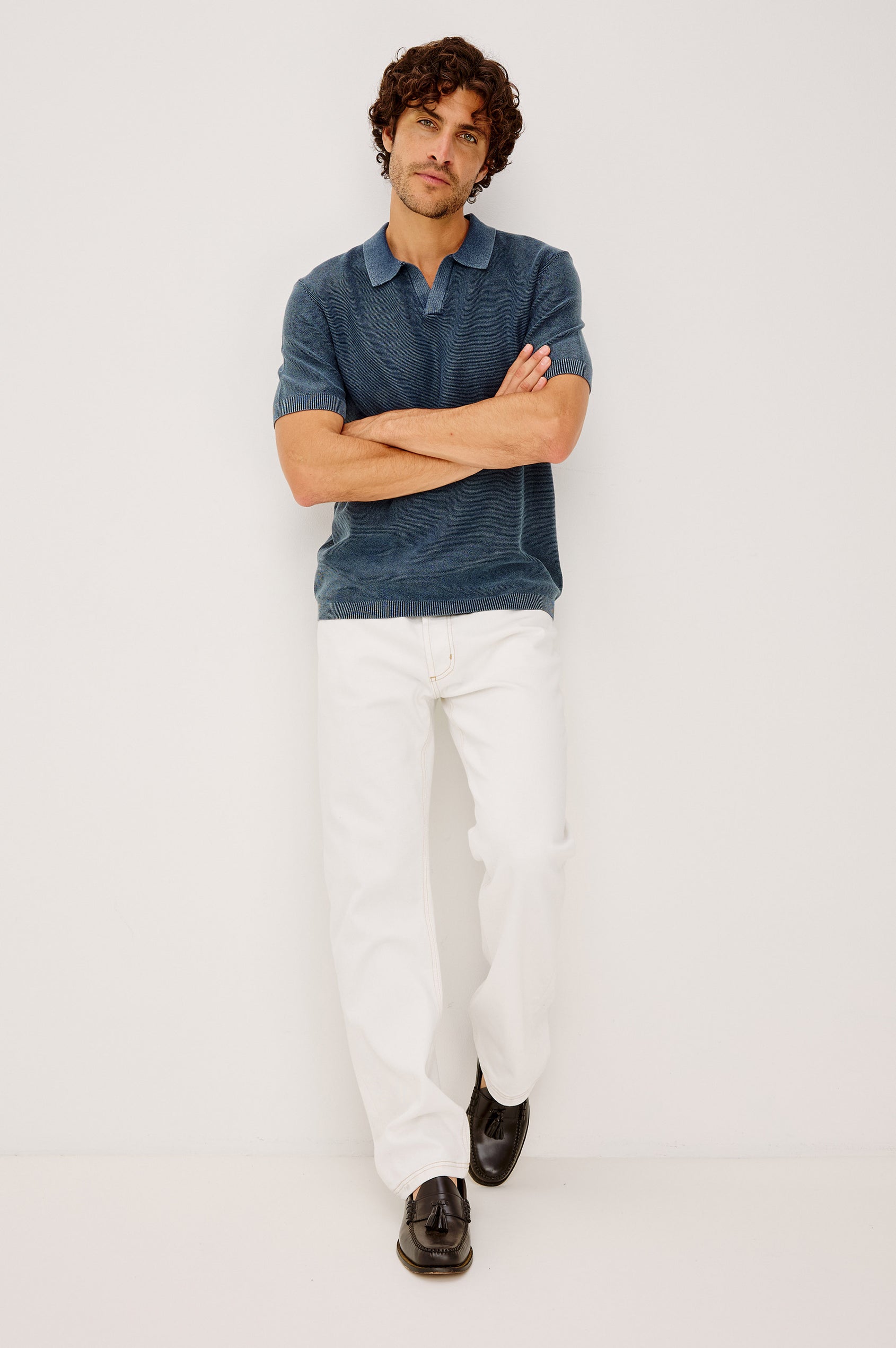 Baker Polo Shirt in Rib Cotton Knit With Colar, Short Sleeves, and Relaxed Fit in Sunwashed Navy Colorway - Full Body Front View Featured on Model