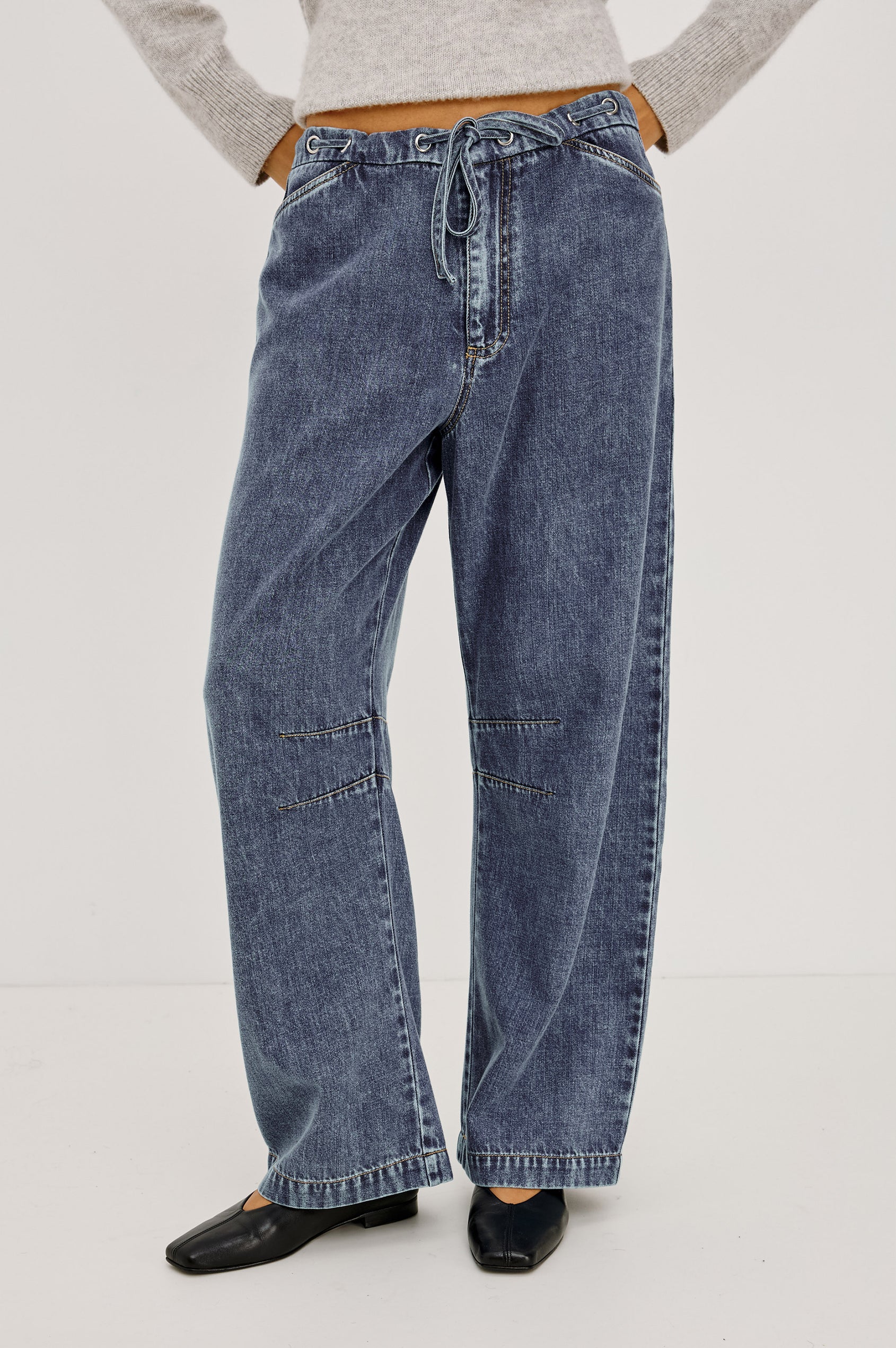 Barry Pant in Cotton Lyocell Denim With Wide Legs That Taper at Hem, Front Zip, Grommet Drawstring Waistband, and Side Slant Pockets in Blue Lagoon Colorway - Lower Body Front View Featured on Model