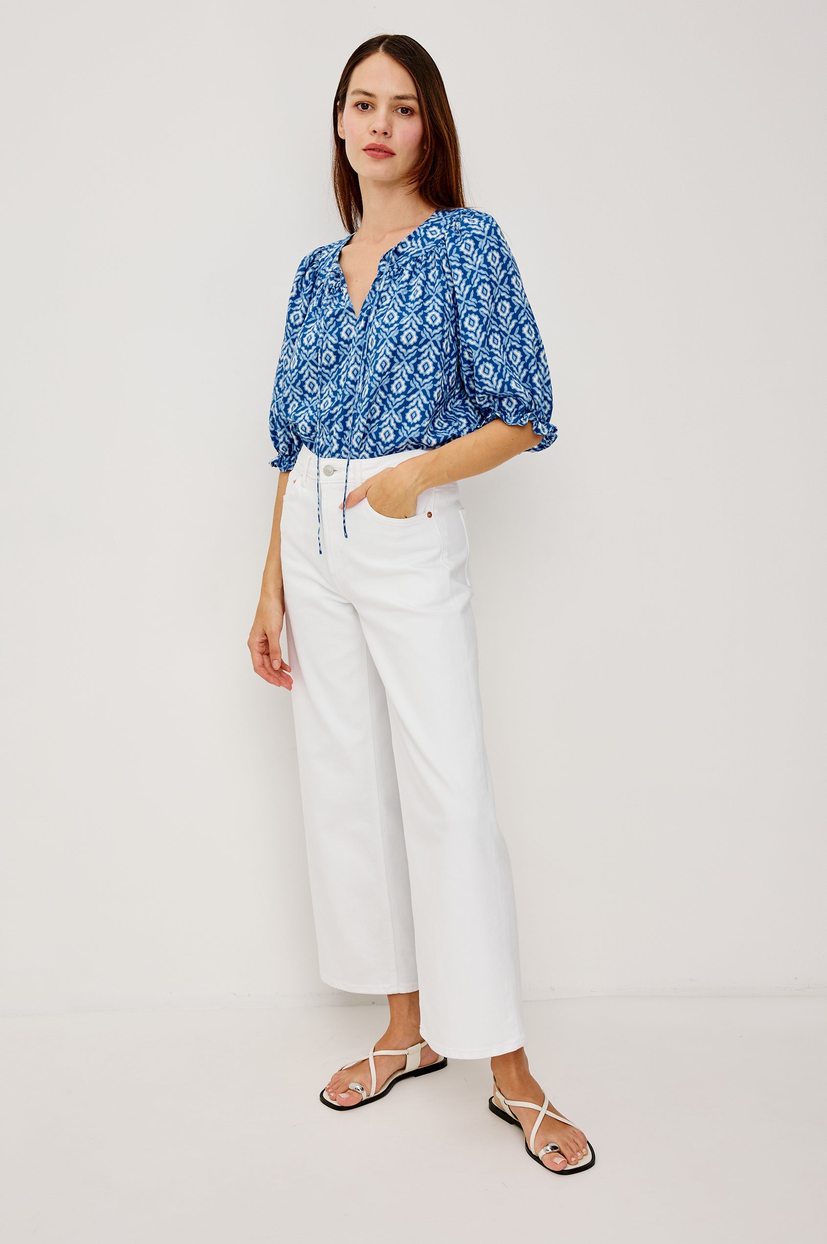 Belina Top With Gathrered V-Neck With Self-Ties Elbow Length Sleeves in Blue Ikat Colorway - Full Body Front View Featured on Model