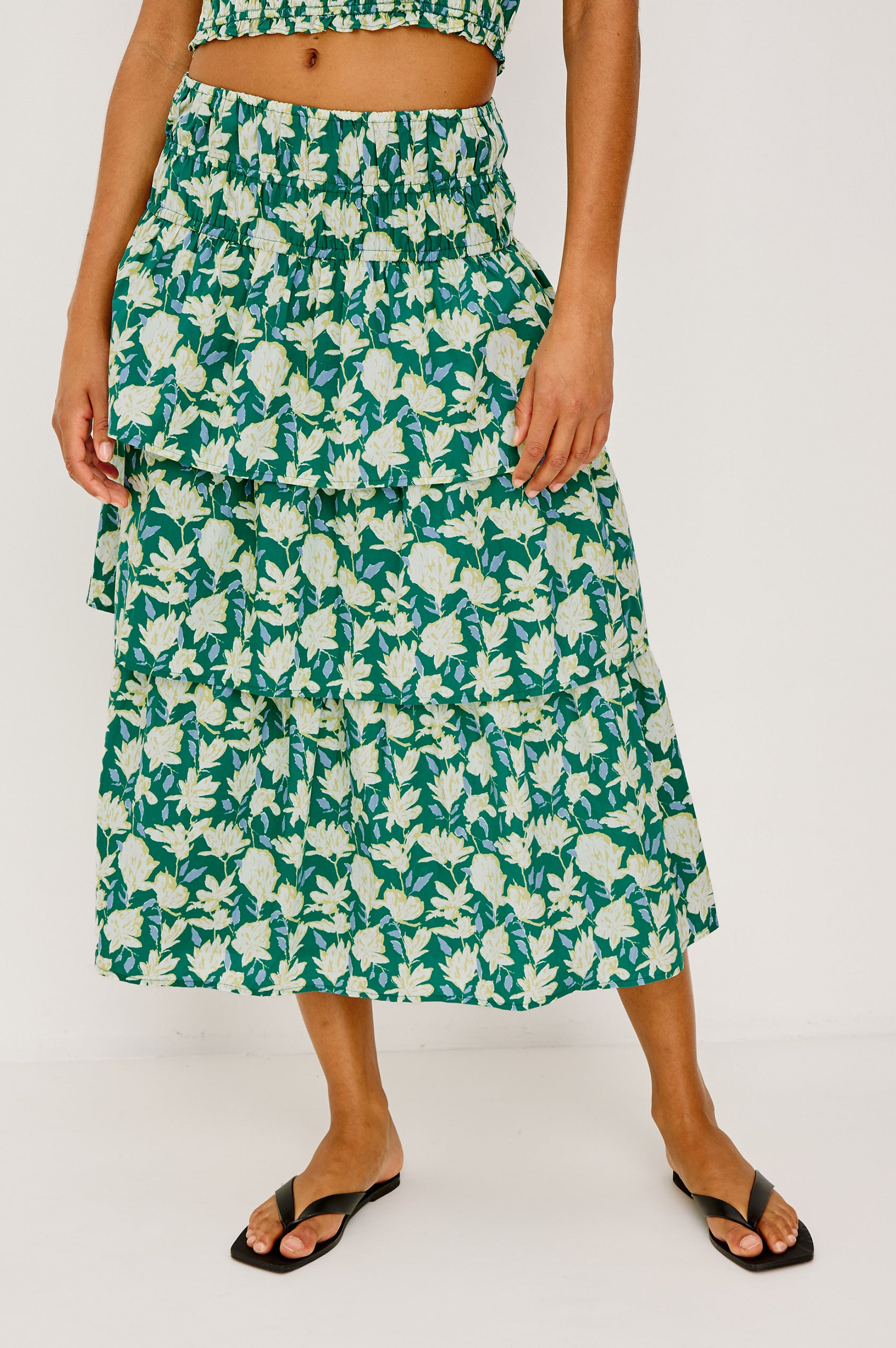 Belle Maxi Skirt in Cotton Poplin With Elastic Waist and Tiered Ruffles in Green Mayflower Colorway - Lower Body Front View Featured on Model