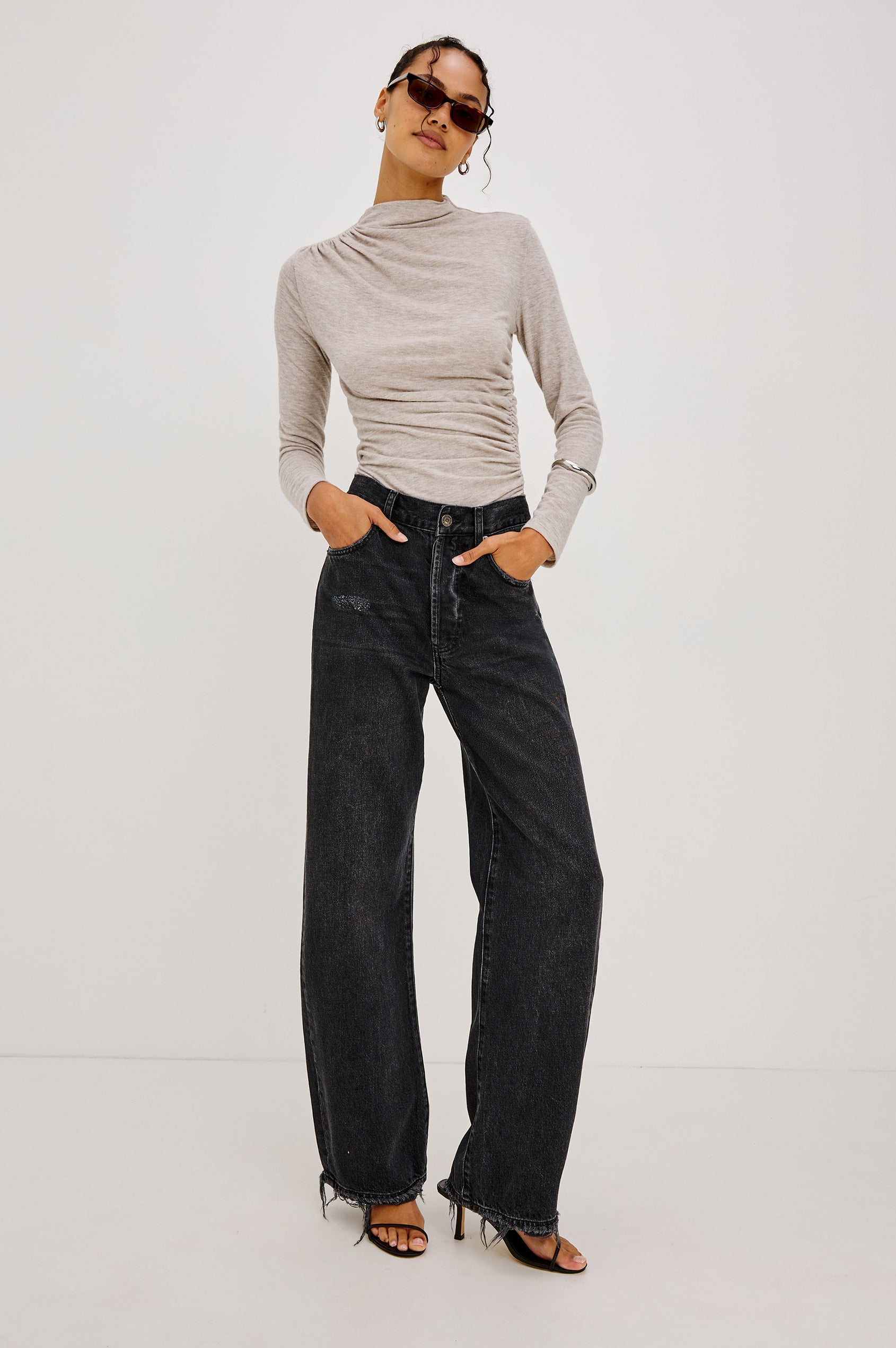 Belmont Petite Arc Leg Jean in Rigid Denim With High Rise, Distressed Detailing, Button Fly, and 5-Pockets in Nightcap Colorway - Full Body Front View Featured on Model