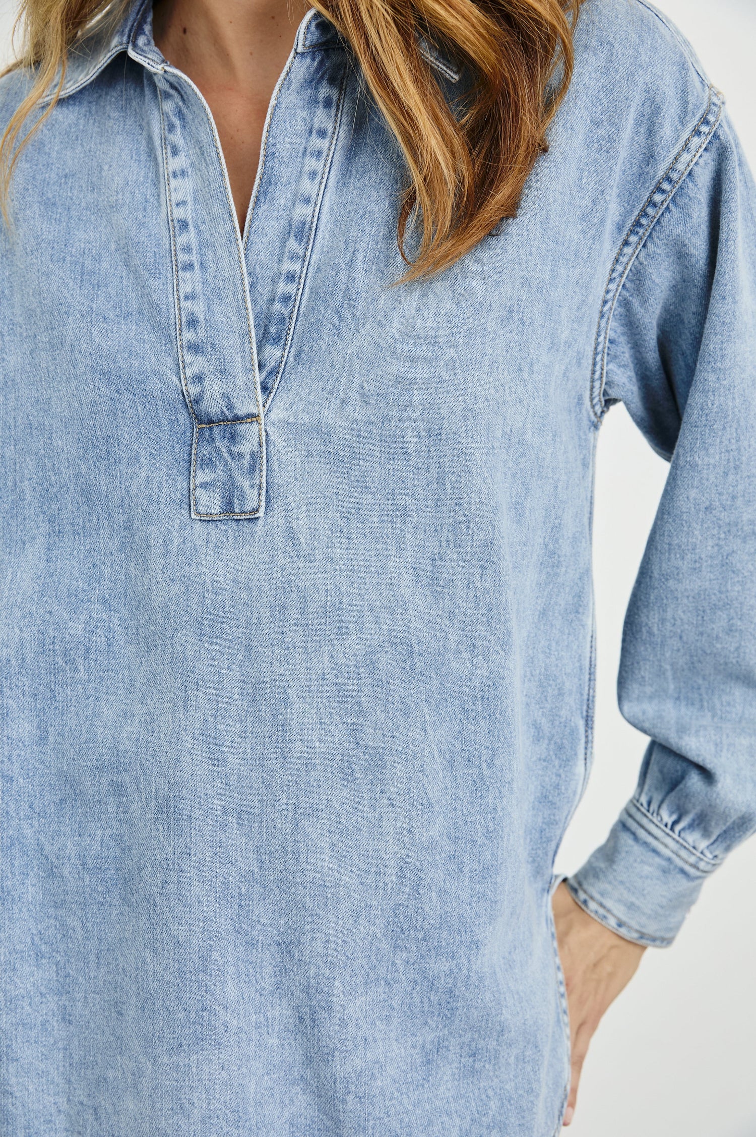 Bennett Denim Long-Sleeve Shirt with a Placket V Neck, a Collar, and Snap Cuffs in Faded Indigo Colorway - Front View Featured on Model 