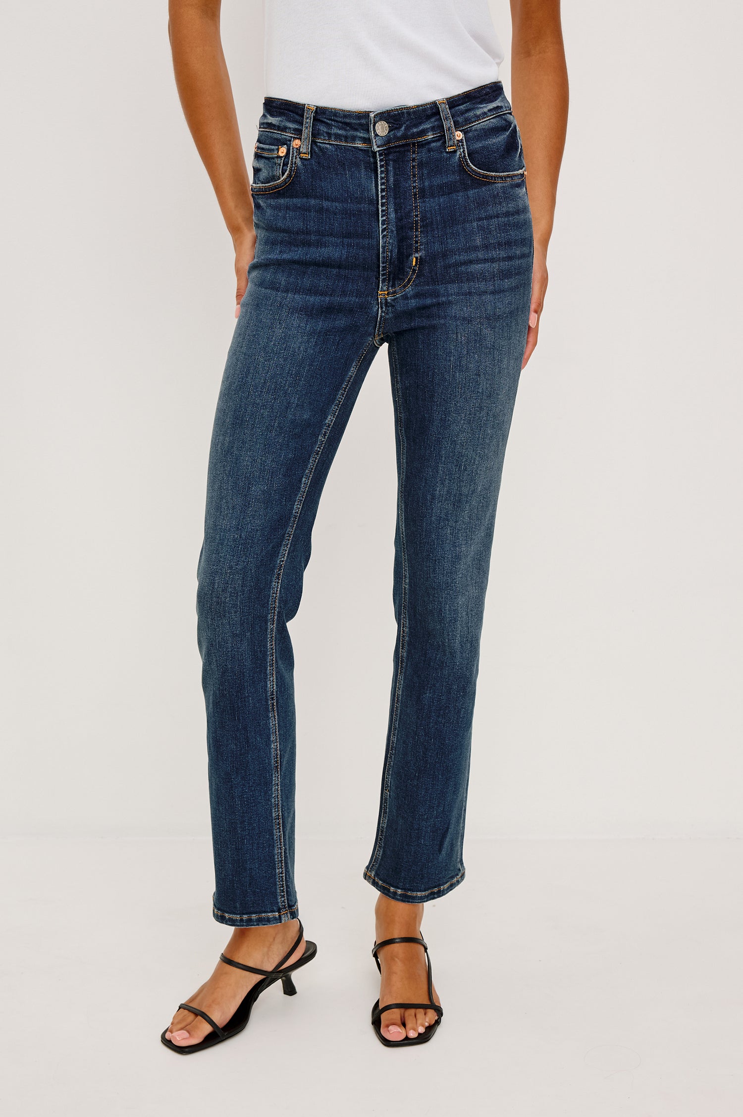 Bixby is a 5-pkt slim straight jean in Deep Dive colorway. Front view featured on model.
