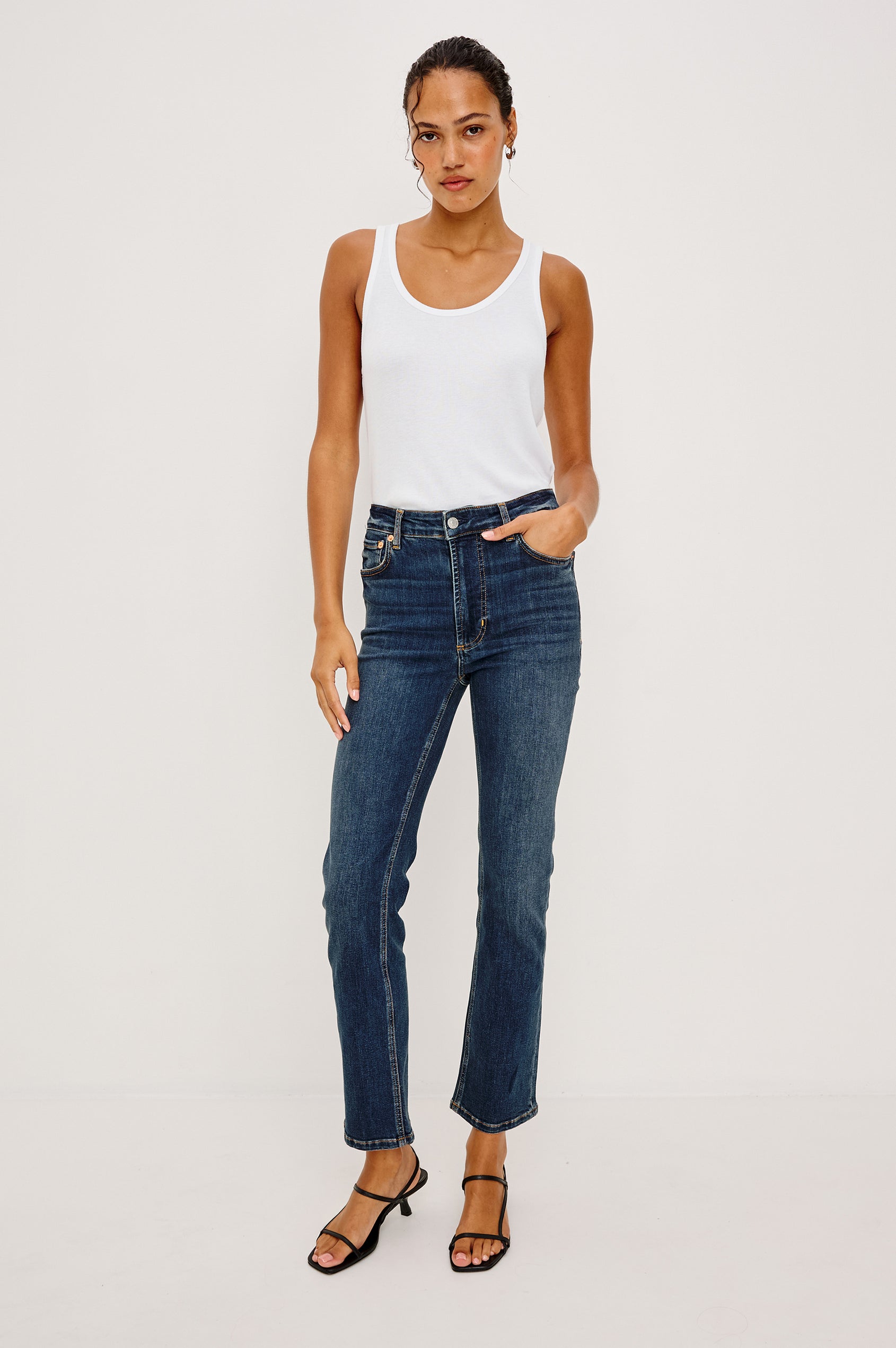 Bixby is a 5-pkt slim straight jean in Deep Dive colorway. Front view featured on model.
