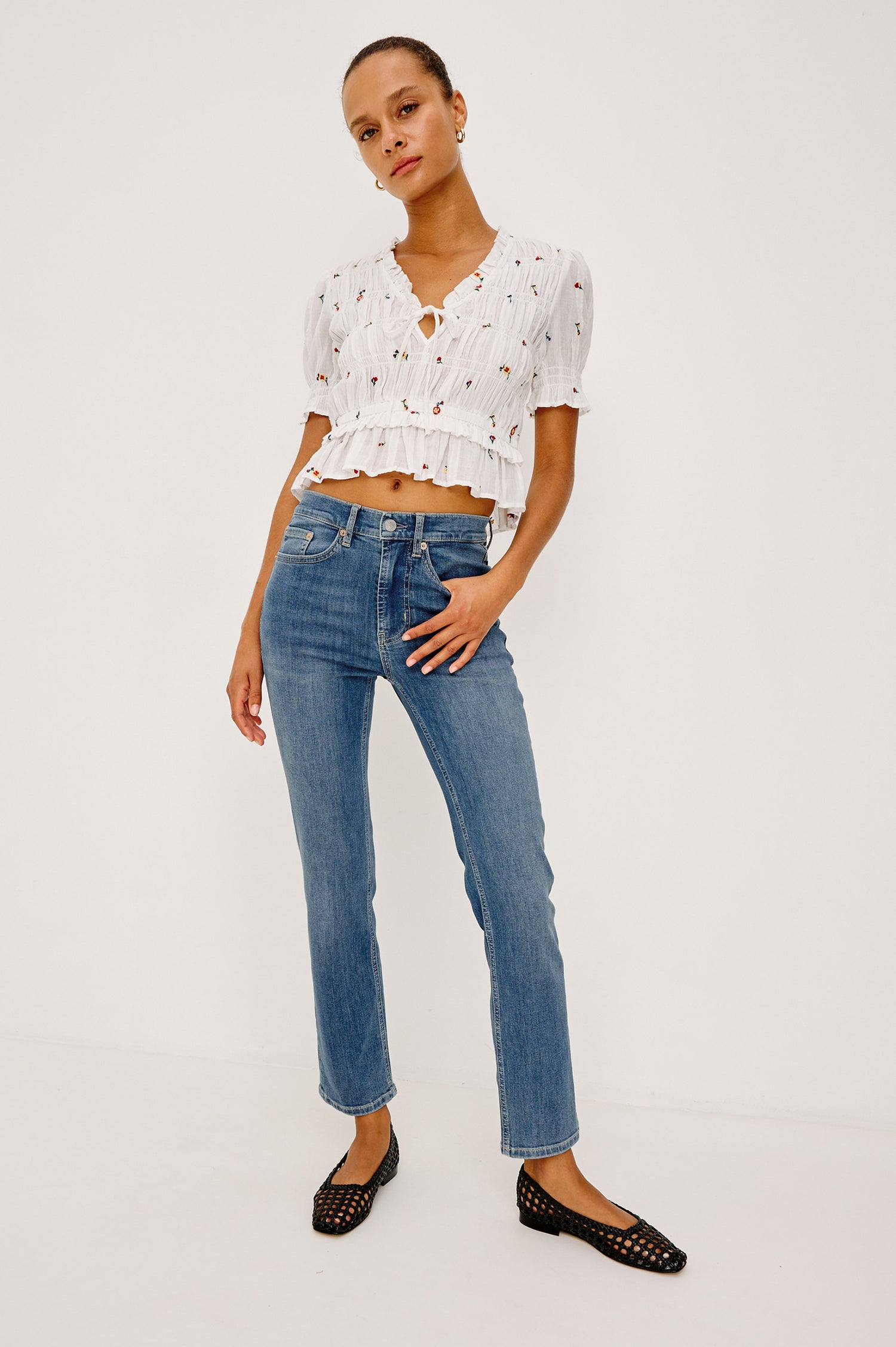 Bixby Mid-Rise Slim Straight Jean in High Stretch Denim With 25" Inseam, Zip Fly, and 5-Pockets in East Coast Colorway - Full Body Front View Featured on Model