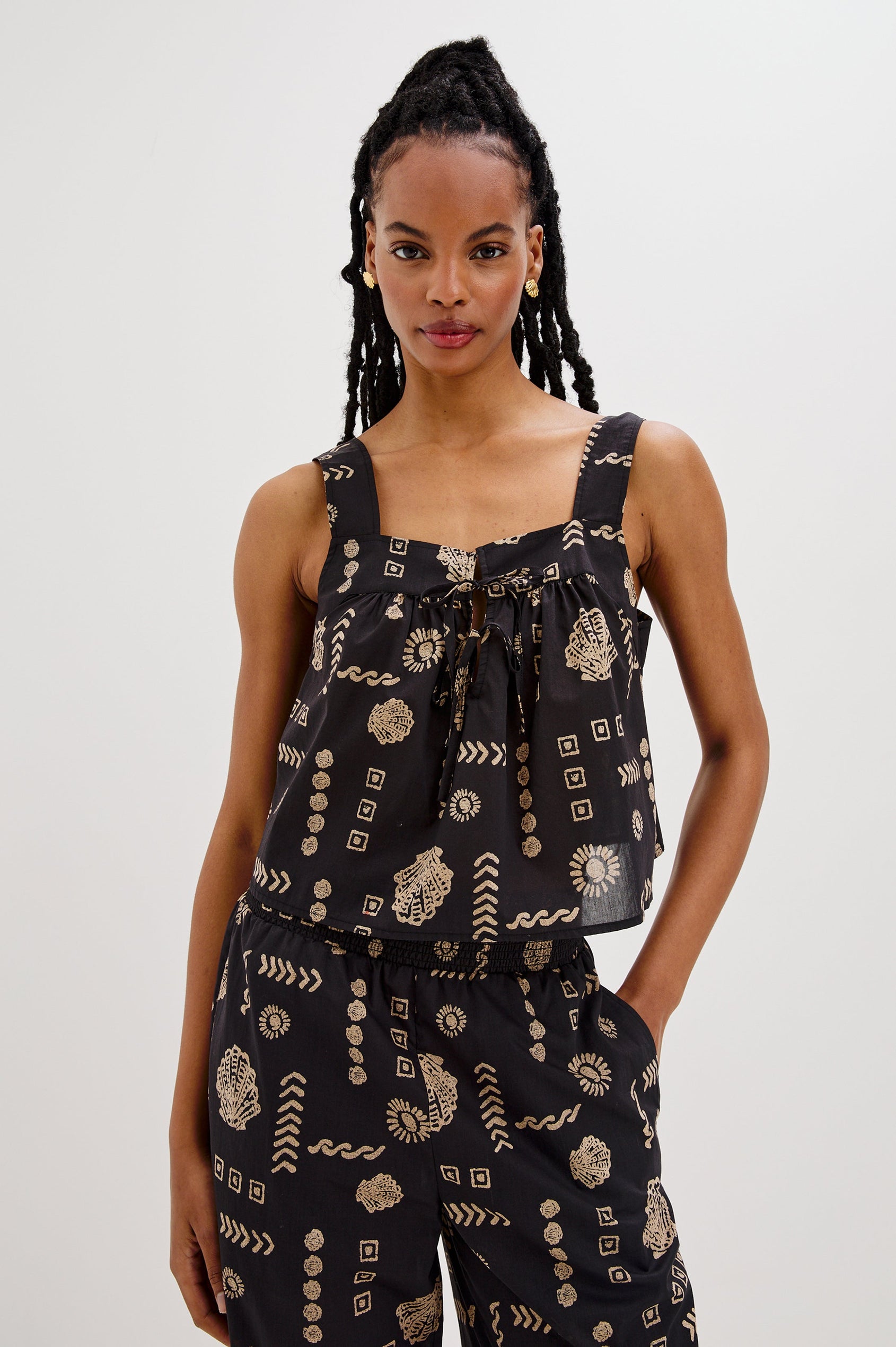 Blythe Square Neck Tank Top with Wide Straps and Two Front Ties in Beach Shells Colorway. Front View Shown on Model.