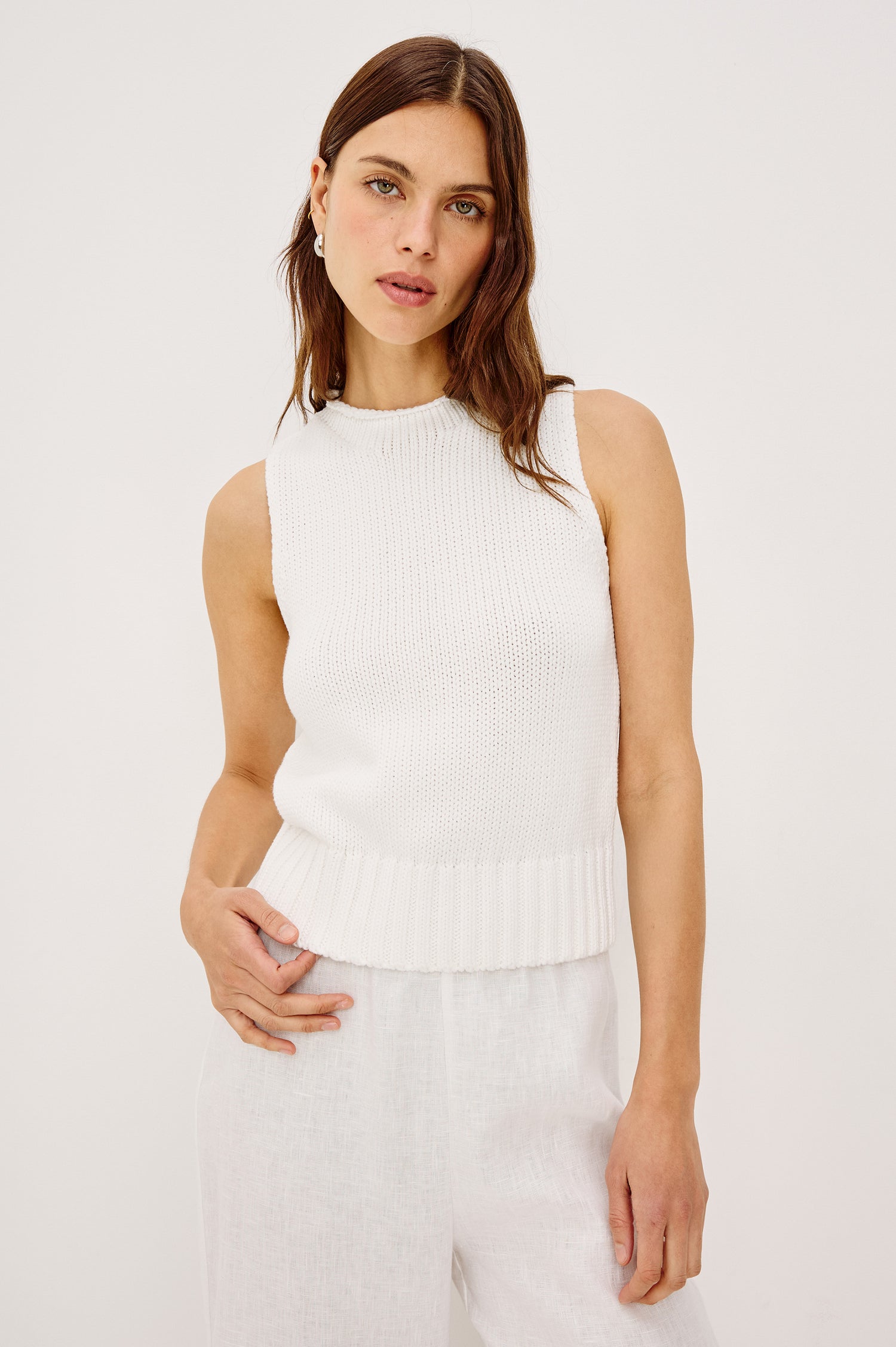 Bondi Sleeveless Vest in Soft Cotton Knit With Rolled Neckline, Relaxed Fit, and Ribbed Hem in White Colorway - Upper Body Front View Featured on Model