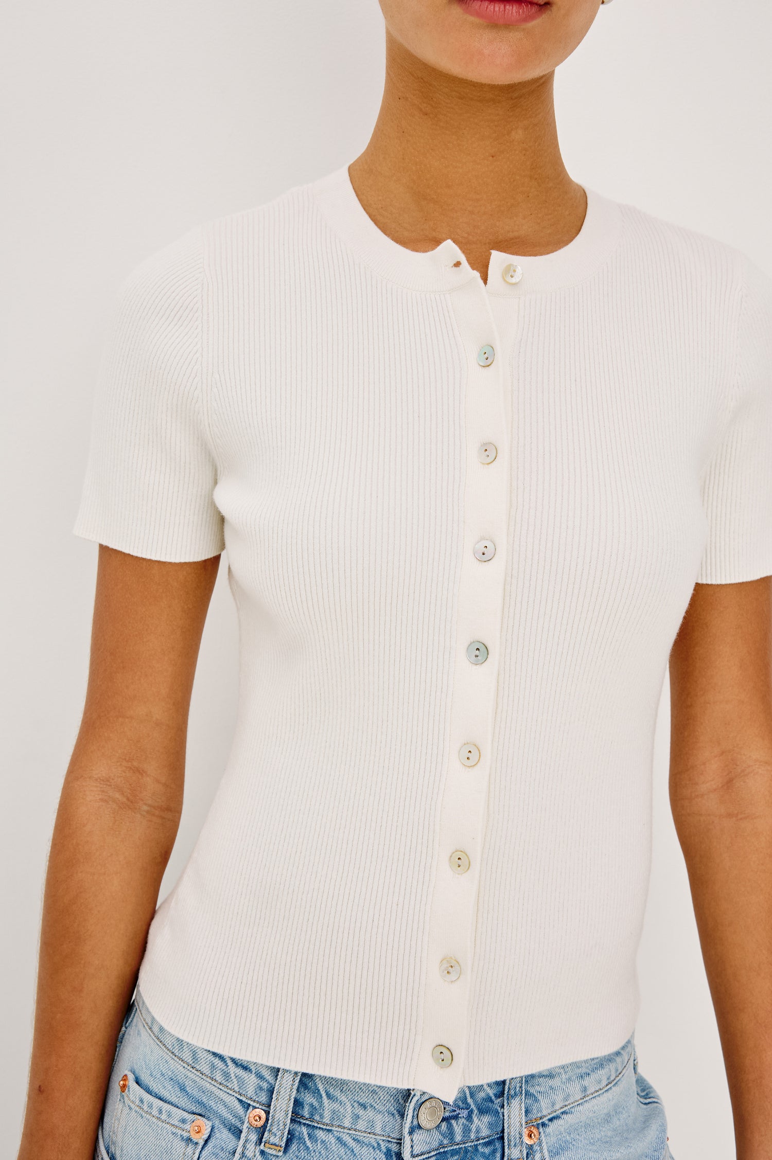 Bonnie Top in Ribbed Cotton With Crew Neckline, Short Sleeves, Front Buttons, and Classic Fit in Ivory Colorway - Upper Body Close Up Front View Featured on Model