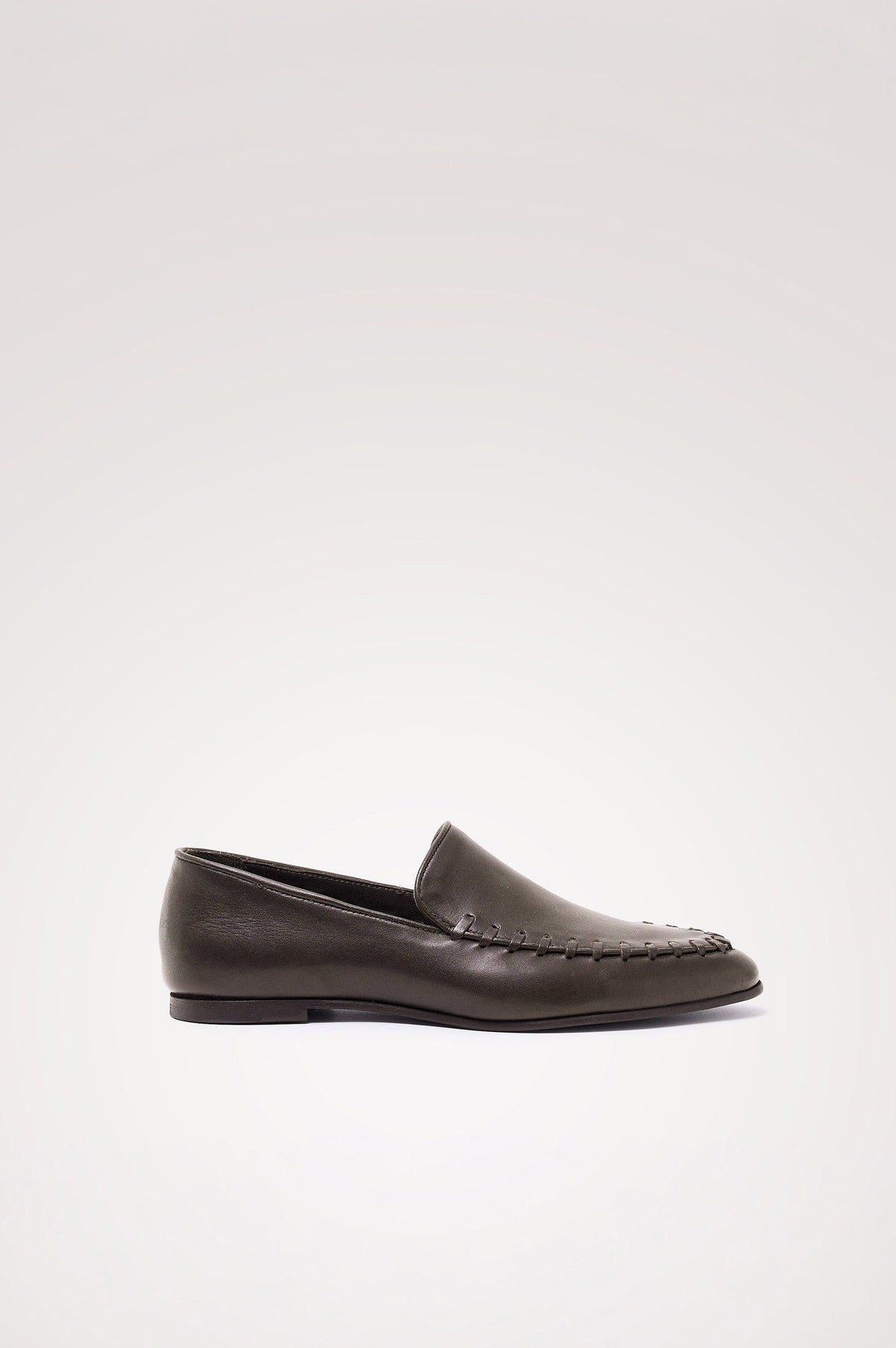 Braga Loafer in Full-Grain Leather With Whipstitch Trim, Narrow Vamp, and Low Heel in Dark Brown Colorway - Side Product View Featured