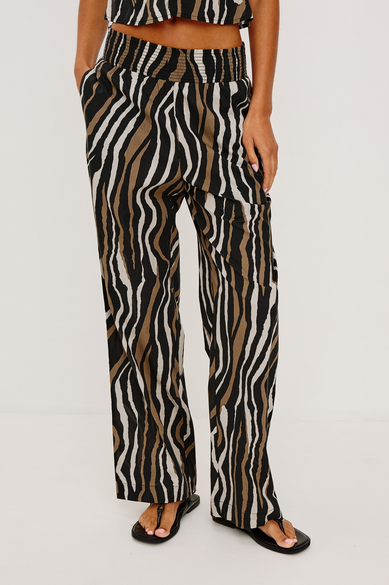Brendon High-Rise High-Waisted Pant in Beach Cotton With Wide Legs and Smocked Waistband in Canyon Stripe Colorway - Lower Body Front View Featured on Model