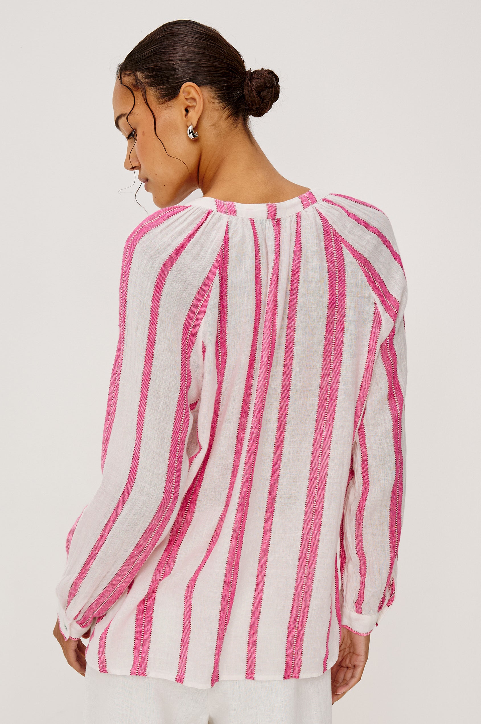 Brielle Blouse in Linen With Mandarin Collar, Loose Fit, Deep V-Neckline With Self-Ties, and Long Sleeves in Delfine Stripe Colorway - Upper Body Back View Featured on Model