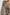 Brielle Long-Sleeve Top with a Deep V Neck with Ties and Pleats around the Neckline in Swirls Colorway, with white swirls on brown - Front View Featured on Model