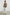 Brielle Long-Sleeve Top with a Deep V Neck with Ties and Pleats around the Neckline in Swirls Colorway, with white swirls on brown - Front Full Body View Featured on Model