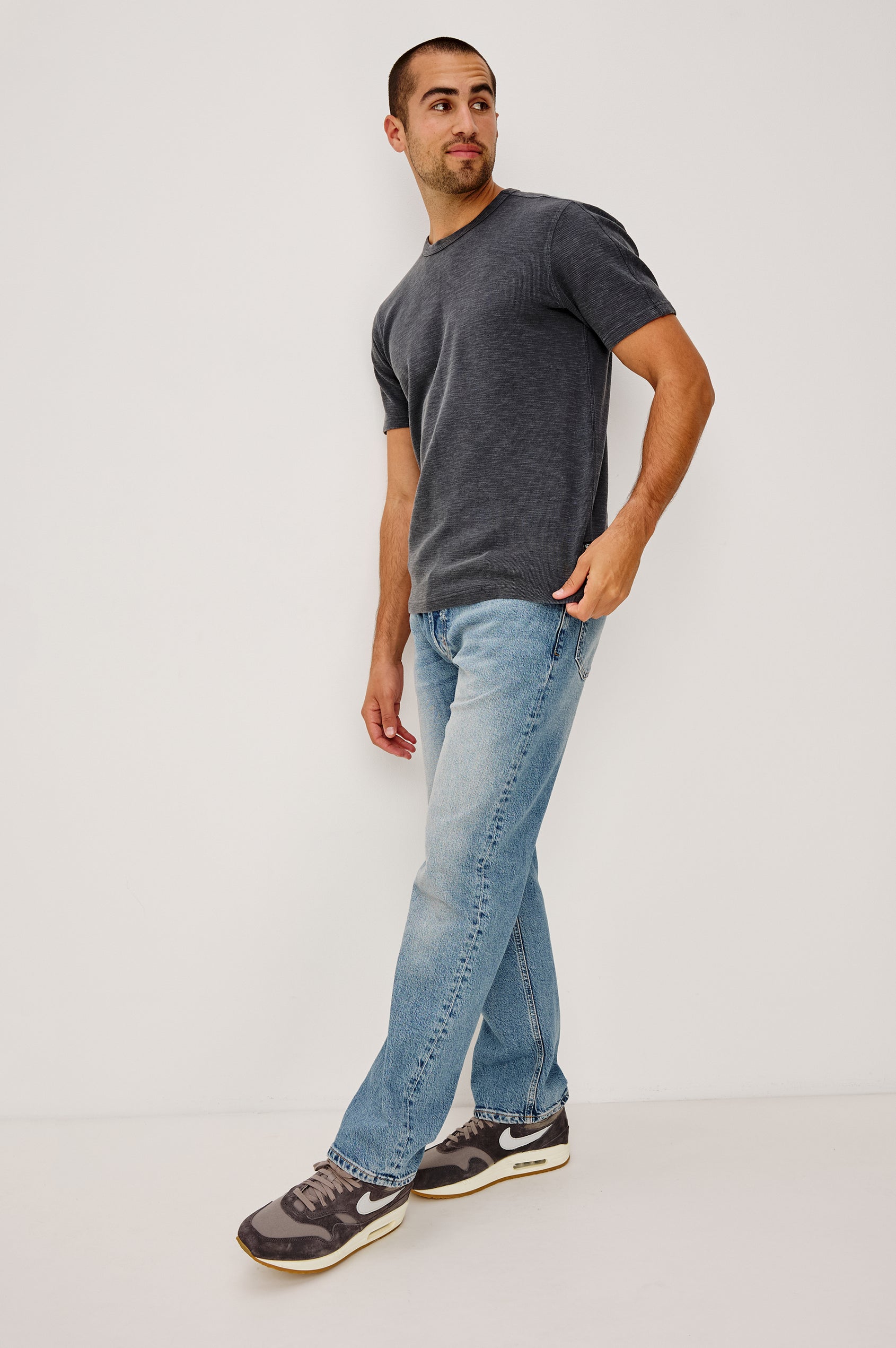 Brooks Short Sleeve T-Shirt With Crew Neckline, Short Sleeves, and Classic Fit in Washed Black Colorway - Full Body Front View Featured on Model