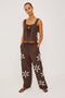 Calais Tank Top in Heavy Linen With Boxy, Loose Relaxed Cropped Fit, Wide Shoulder Straps, and V-Neckline With Adjustable Front Ties in Cocoa Floral Embroidery Colorway - Full Body Front View Featured on Model