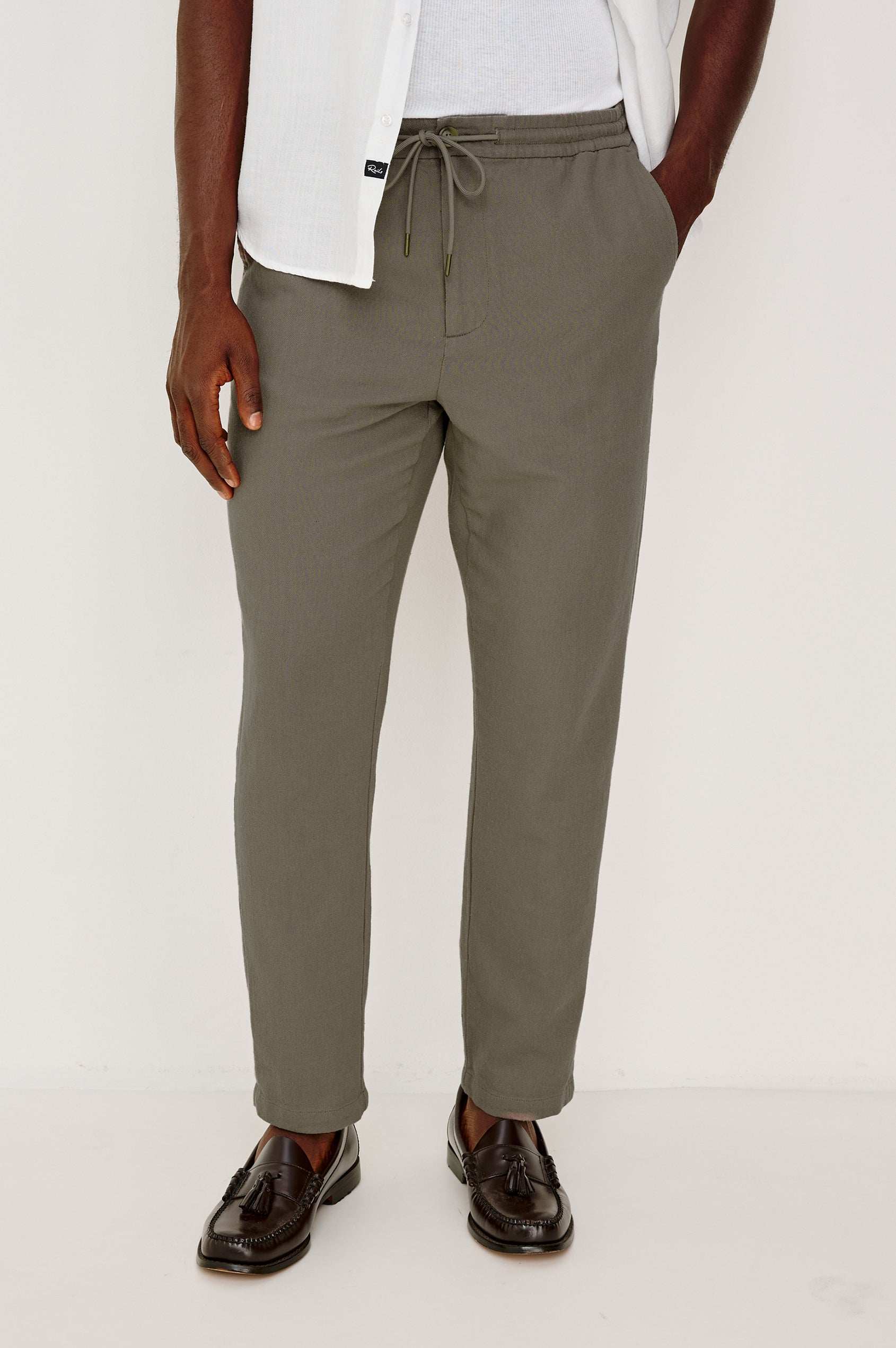 Callum Tapered Straight Leg Pant in Linen Twill With Adjustable Drawstring Waistband Ties in Fallen Rock Colorway - Lower Body Back View Featured on Model