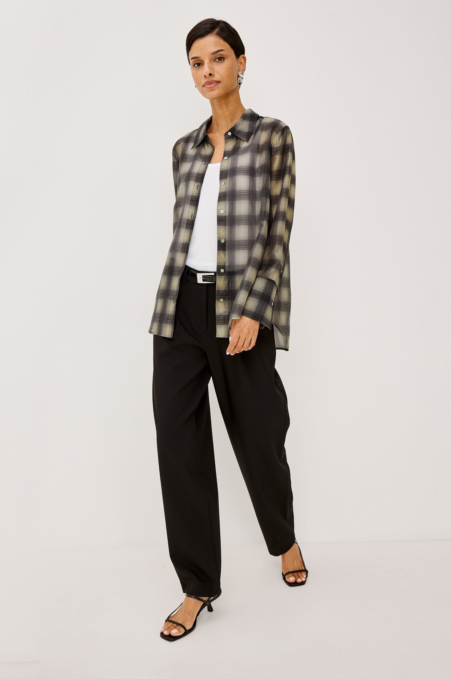 Cameron Pant in Springy Suiting Fabric With High-Rise, Pleated Barrel Legs That Taper, Side and Back Pockets, and Unlined in Black Colorway - Full Body Front View Featured on Model