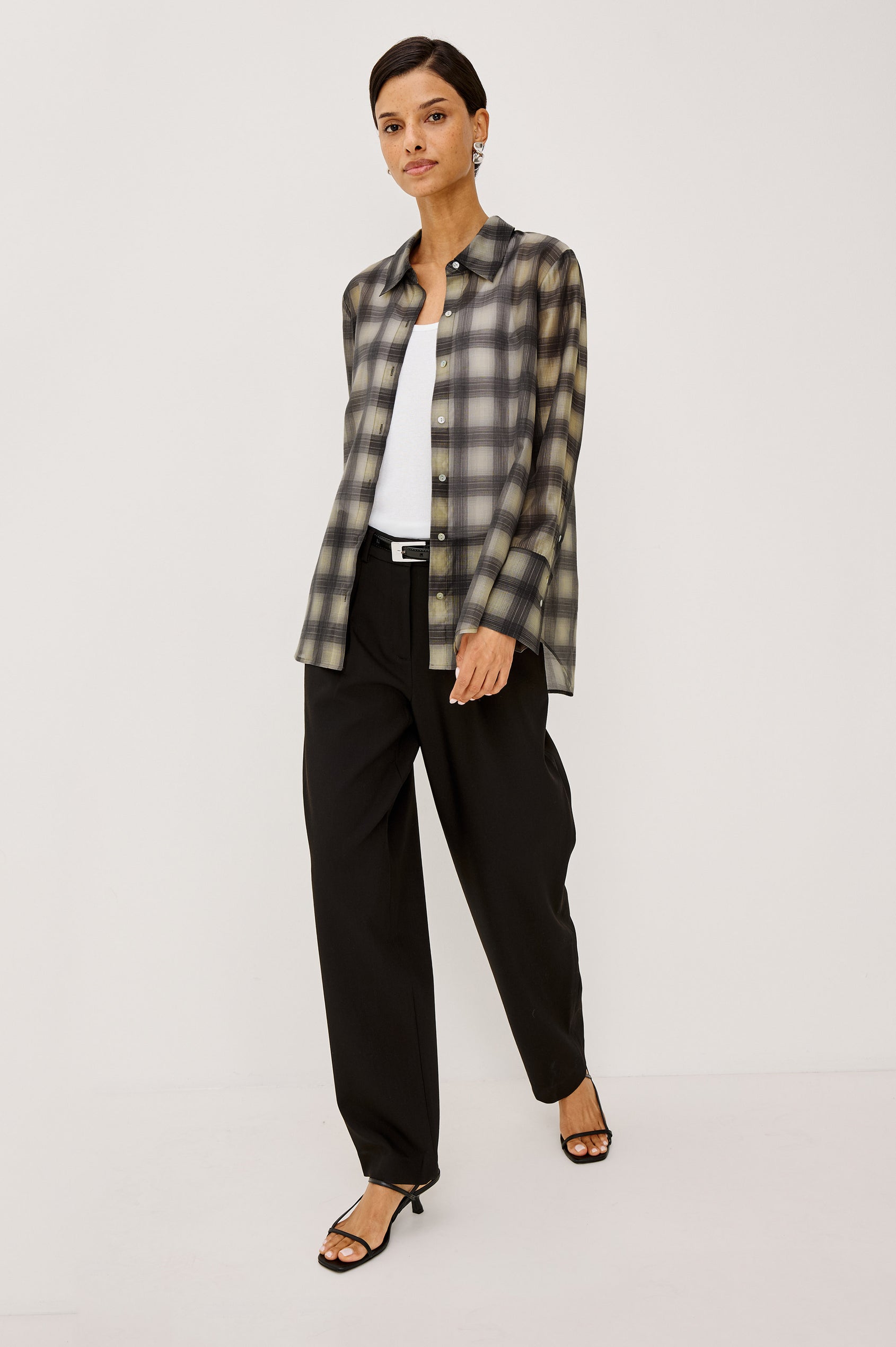 Cameron Pant in Springy Suiting Fabric With High-Rise, Pleated Barrel Legs That Taper, Side and Back Pockets, and Unlined in Black Colorway - Full Body Front View Featured on Model