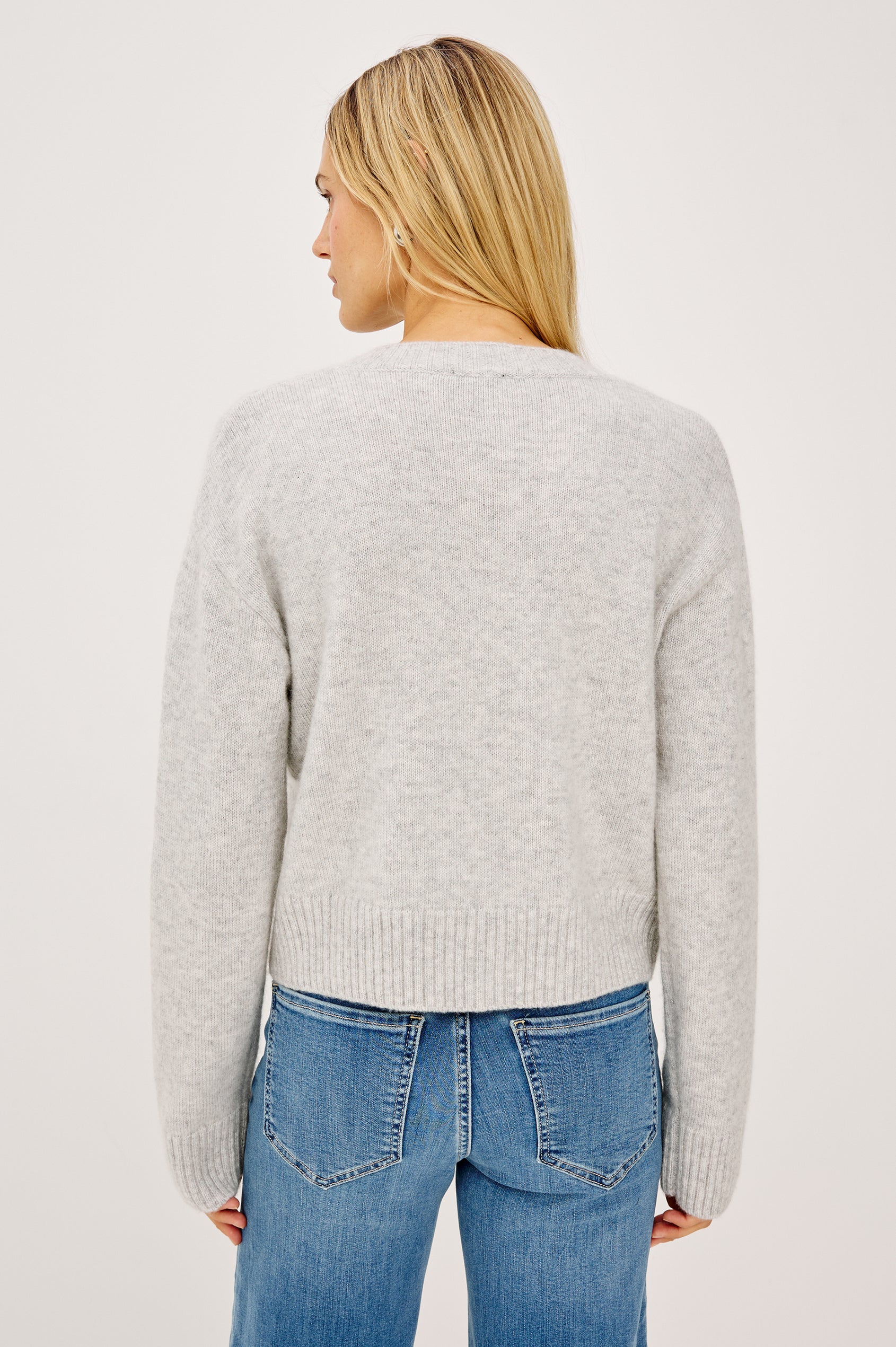 Carre Cardigan in Wool-Cashmere Knit Blend, Relaxed Slightly Boxy Fit, Crew Neckline, Front Buttons, Long Sleeves, and Ribbed Trim in Heather Grey Colorway - Upper Body Back View Featured on Model