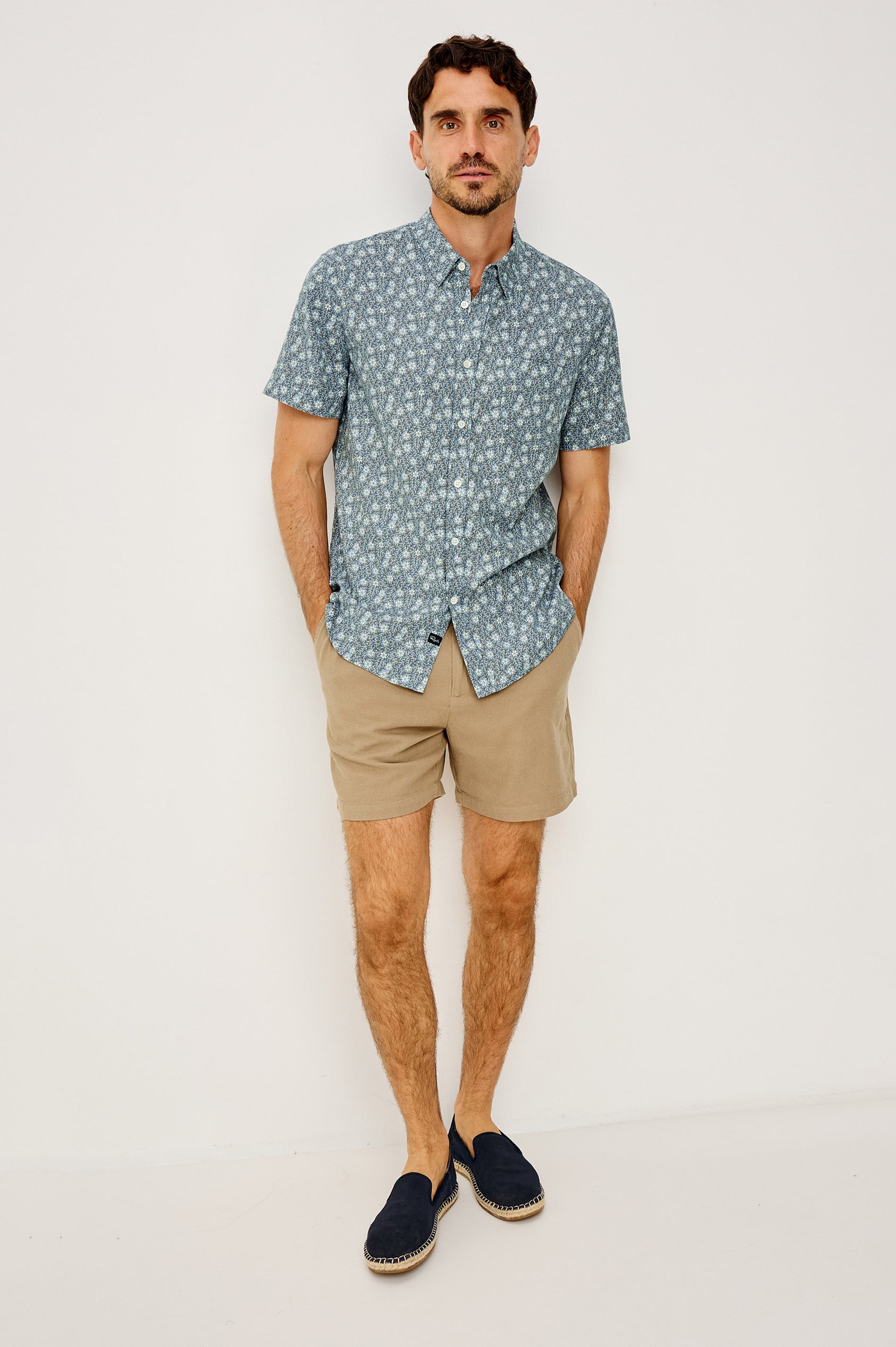 Carson Button-Up Shirt in Linen Blend With Collar, Short Sleeves, Chest Patch Pocket, and Classic Fit in Botanic Batik Crystal Colorway - Full Body Front View Featured on Model