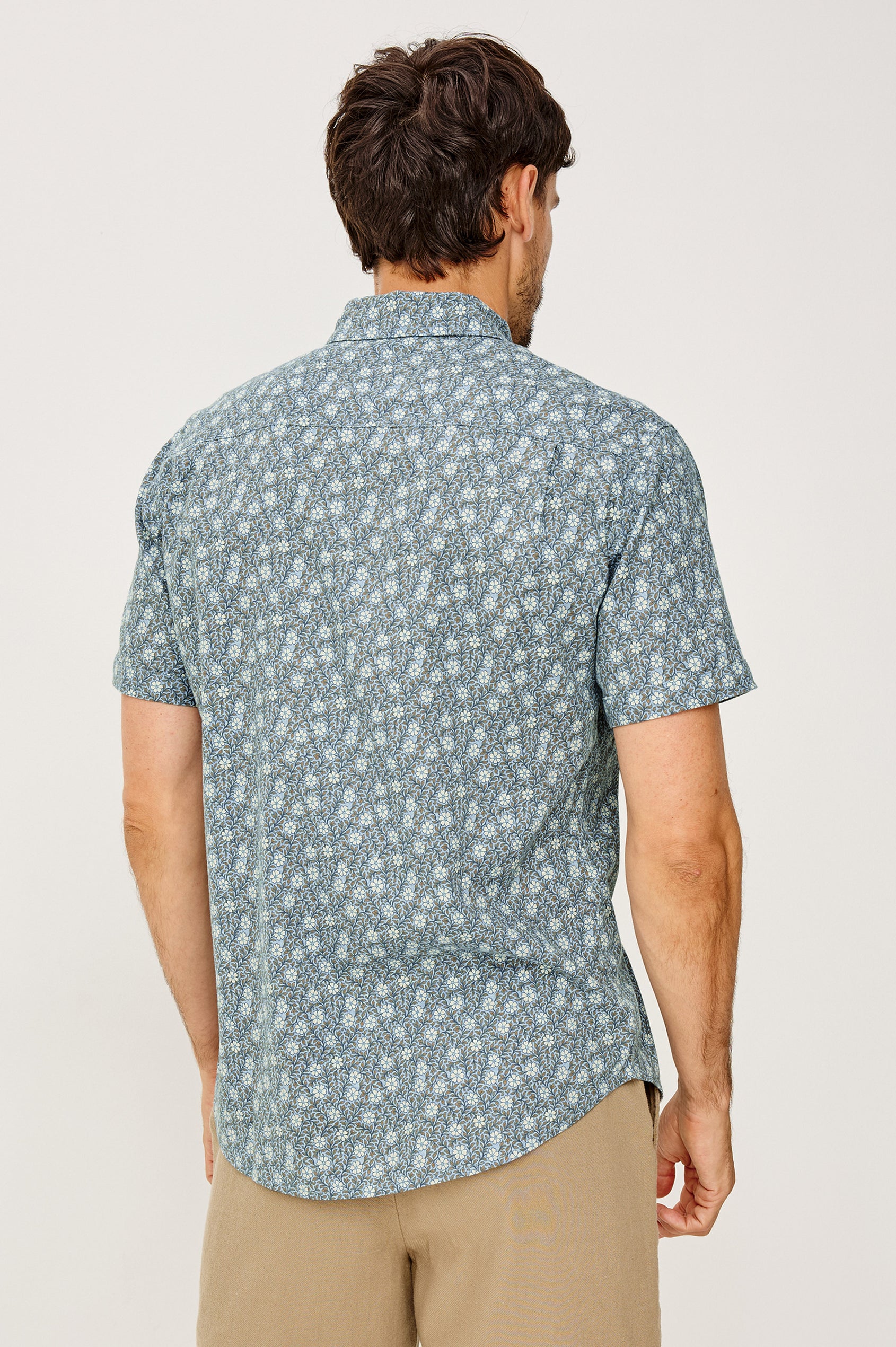 Carson Button-Up Shirt in Linen Blend With Collar, Short Sleeves, Chest Patch Pocket, and Classic Fit in Botanic Batik Crystal Colorway - Upper Body Back View Featured on Model