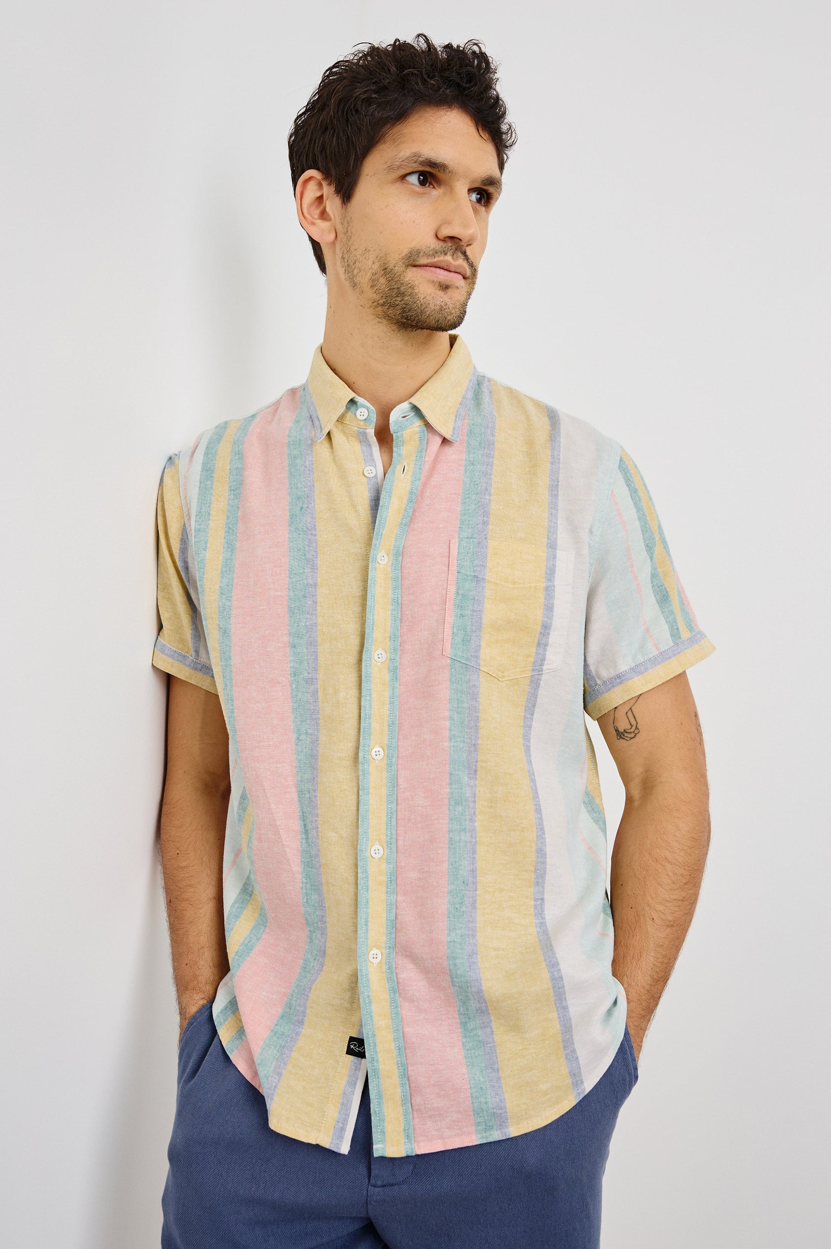 Carson Collared Button Front Shirt with Short Sleeves and a Chest Pocket in Portofino Stripe Colorway. Front View Shown on Model.