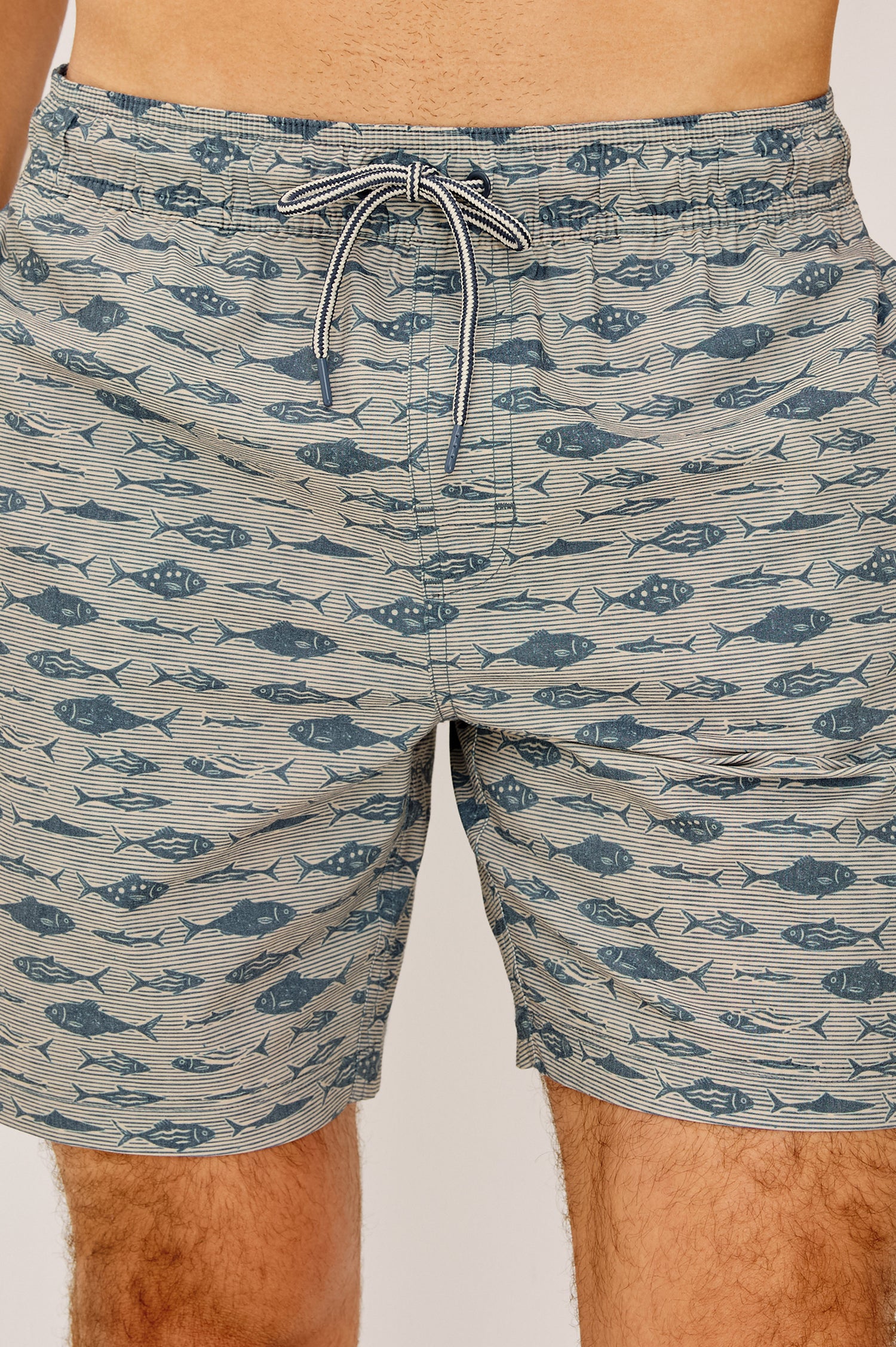 Carson Button-Up Shirt in Lighweight Seersucker With Collar, Chest Patch Pocket, Short Sleeves, and Classic Fit in Vintage Aquarium Etch Batik Colorway - Lower Body Front View Featured on Model