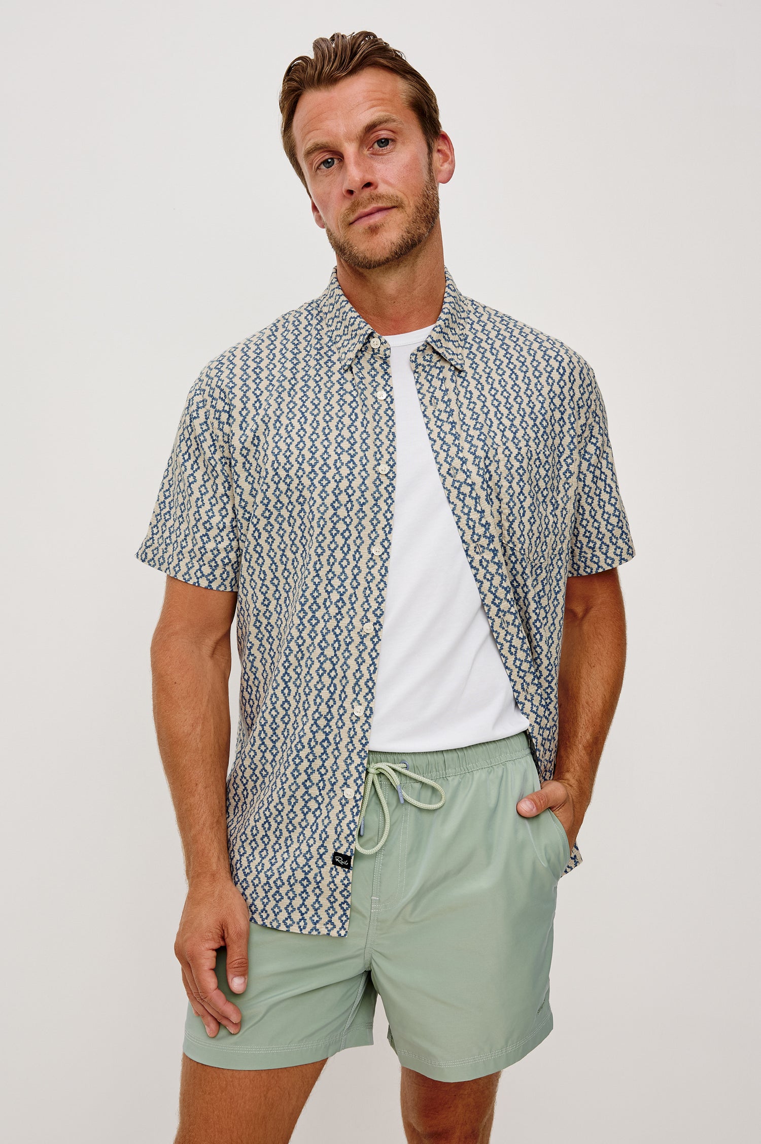 Carson Button-Up Short Sleeve Shirt in Linen Blend With Collar and Classic Fit in Wavy Batik Coast Colorway - Full Body Front View Featured on Model