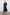 Caterine Maxi Dress with Mid-length Sleeves, a V neck, a Shirred Collar with a tie, a Smocked Waist, and a Tiered Skirt in Navy Colorway - Front Full Body View Featured on Model