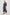 Caterine Maxi Dress with Mid-length Sleeves, a V neck, a Shirred Collar with a tie, a Smocked Waist, and a Tiered Skirt in Roche Stripe Colorway - full body front view, model in motion