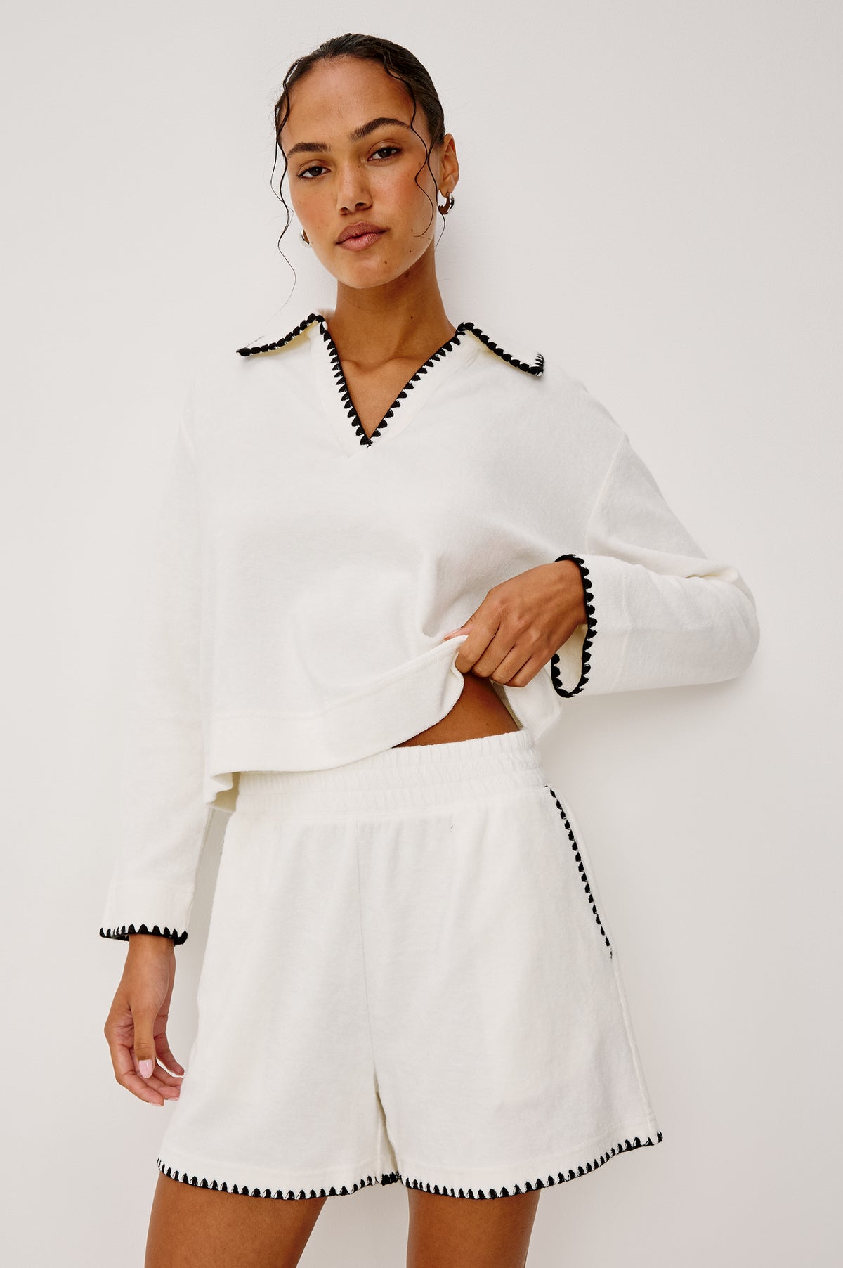 Cati Shirt in Terry With Collar, V-Neckline, Contrast Blanket Stitch Detailing, and Long Sleeves in Ivory Colorway - Upper Body Front View Featured on Model