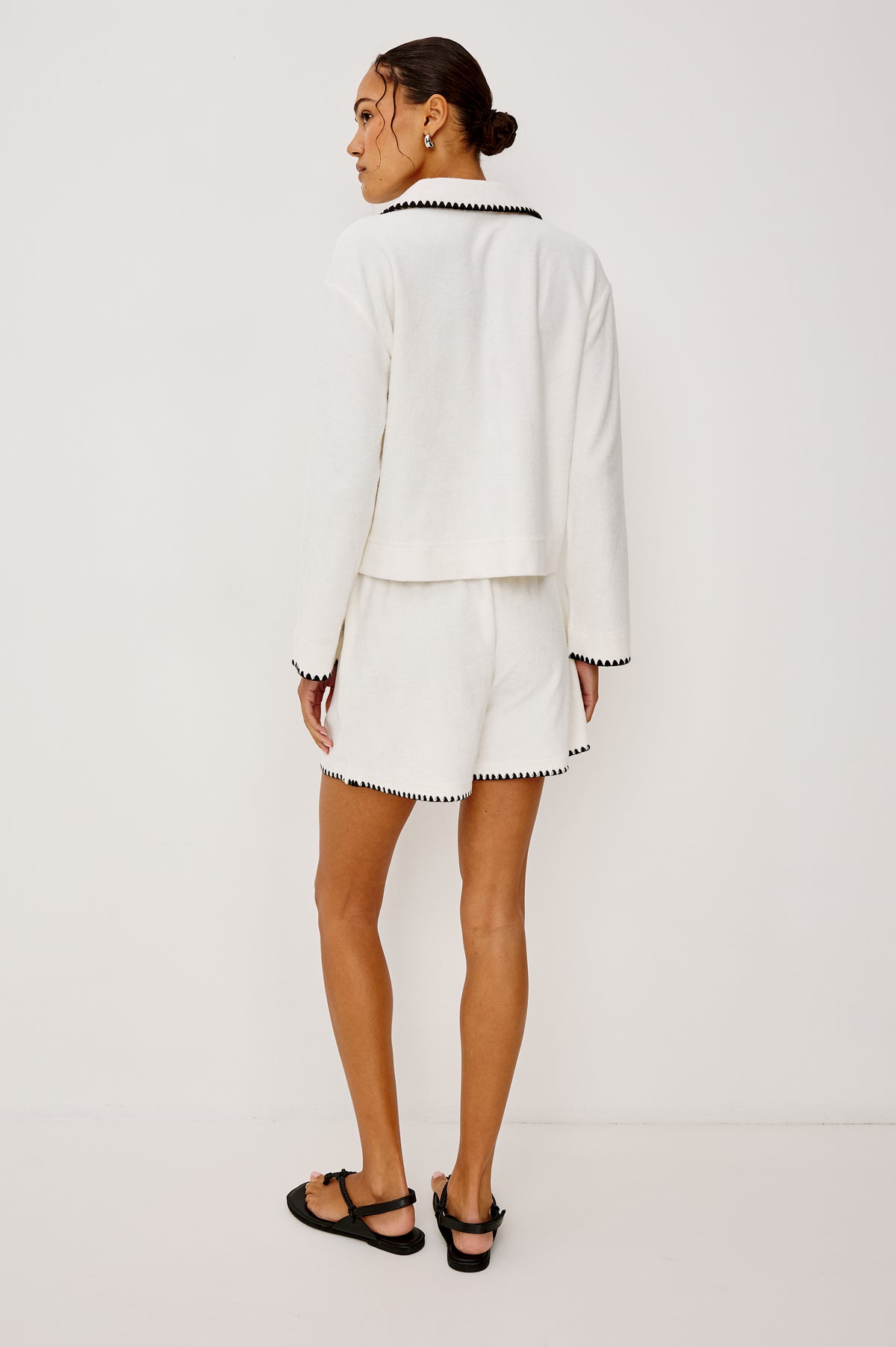 Cati Shirt in Terry With Collar, V-Neckline, Contrast Blanket Stitch Detailing, and Long Sleeves in Ivory Colorway - Full Body Back View Featured on Model