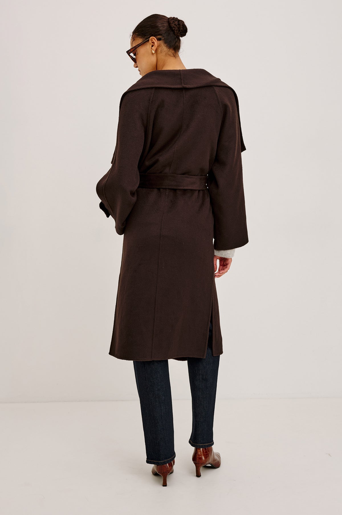 Celeste Coat in Heavy Wool Blend With Shawl Collar, Full Length, Self-Belted Waist, Side Pockets, Button-Tab Cuffs, and Half-Lined Interior in Chocolate Colorway - Full Body Back View Featured on Model