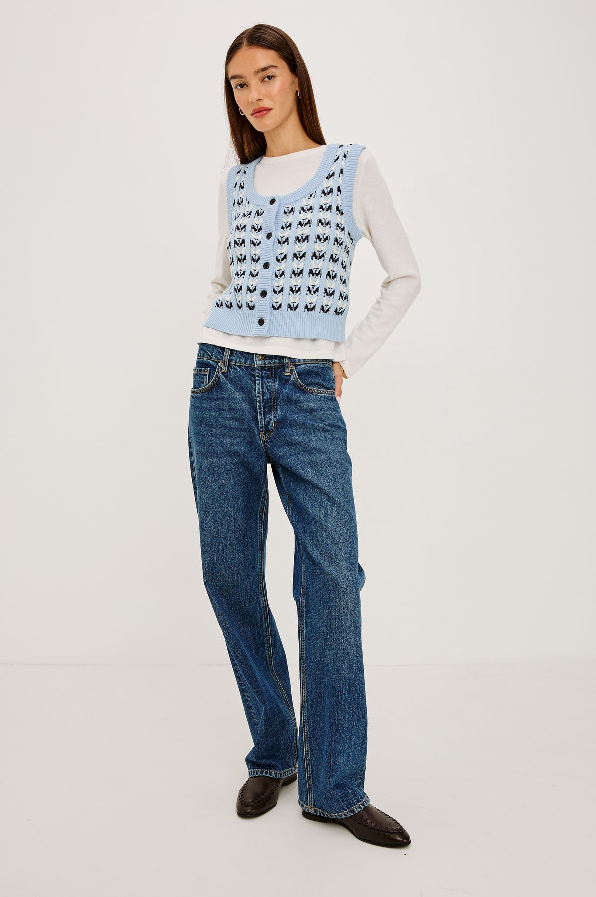 Chance Vest in Cable Knit With Scoop Neckline, Sleeveless Design, Front Button Closures, and Relaxed Fit in Sky Blue Colorway - Full Body Front View Featured on Model