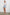 Charli Long-Sleeve Button up with a Chest Patch Pocket in Pink Palm Colorway, with pink vertical stripes dashed with palm trees on ivory  - Front Full Body View Featured on Model