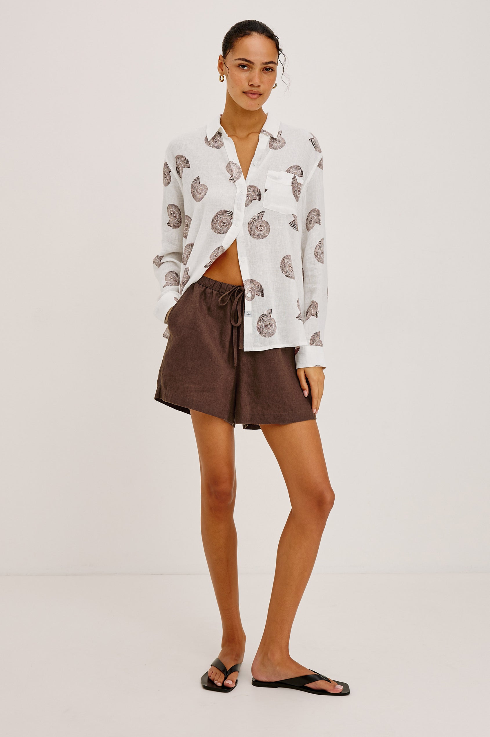 Charli Button-Up Shirt in Linen Blend With Collar, Long Sleeves, Relaxed Fit, and Single Chest Patch Pocket in Spiral Shells Colorway - Full Body Front View Featured on Model