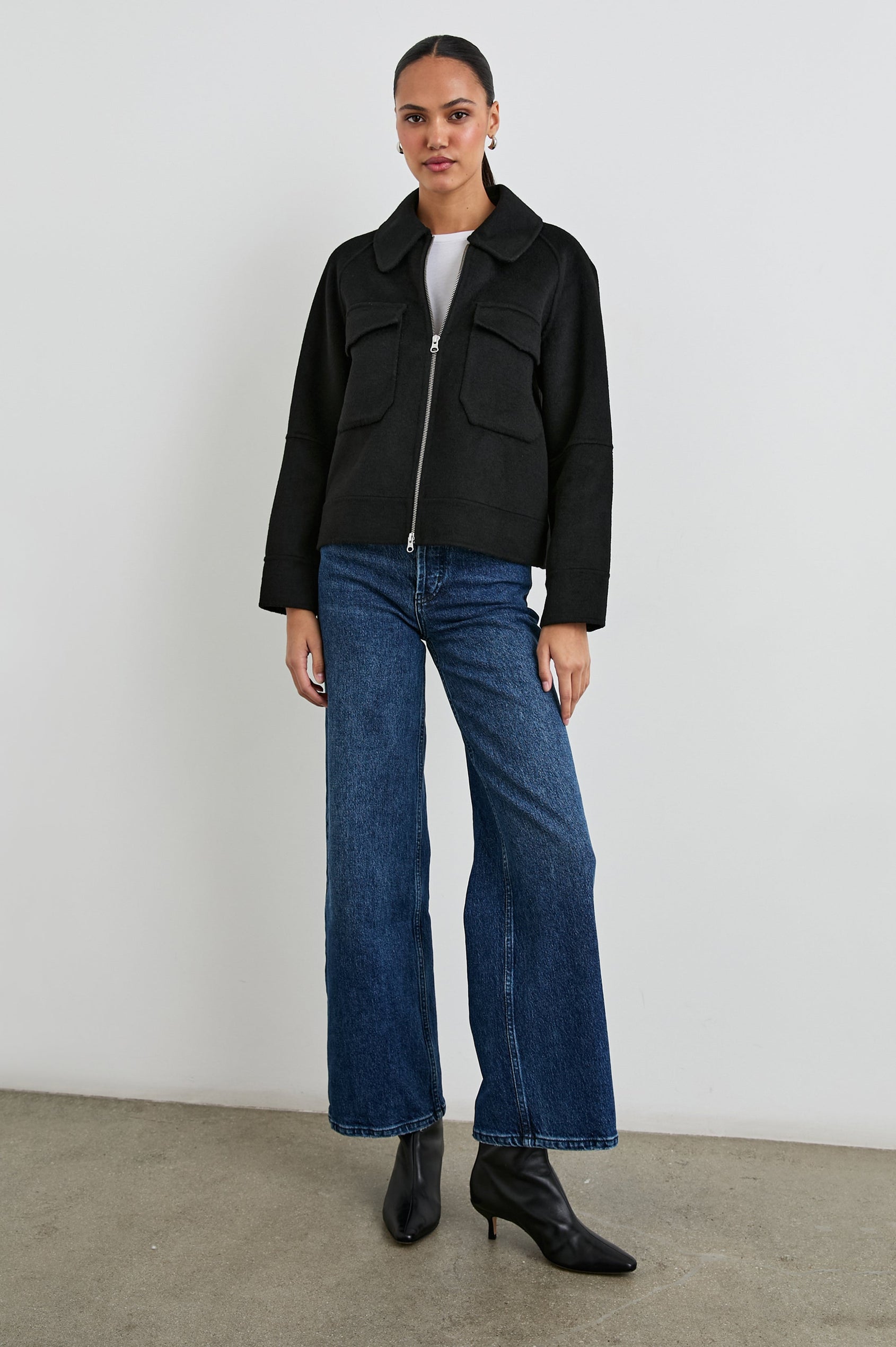 Cheyenne Zip-Up Jacket with Two Chest Flap Pockets and Dual Zipper in Black Colorway - Front Full Body View Featured on Model 