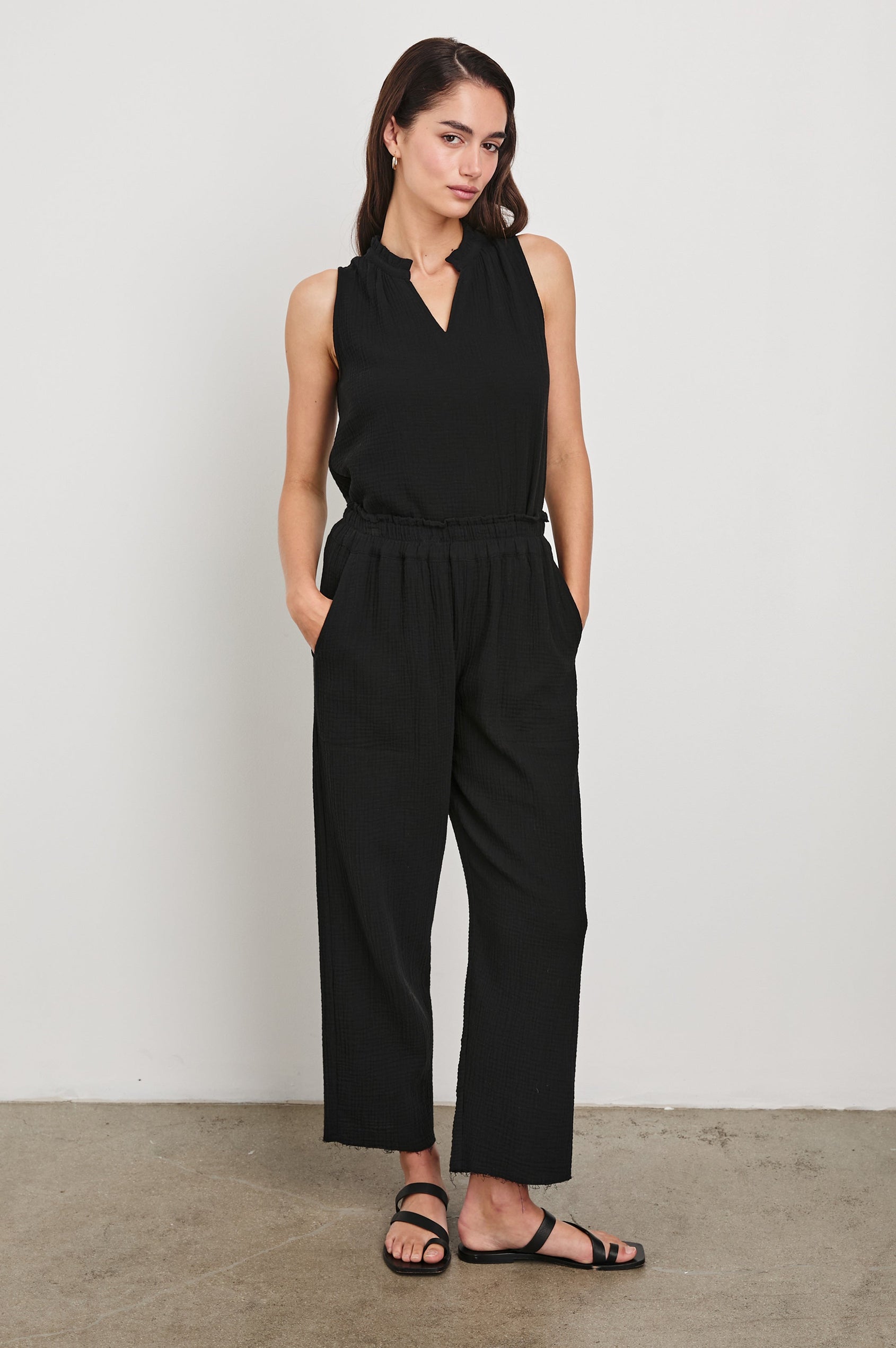 Christy Cotton Gauze Sleeveless Top with Collared V-Neck In Colorway Black - Full Front Body View Tucked In Featured On Model